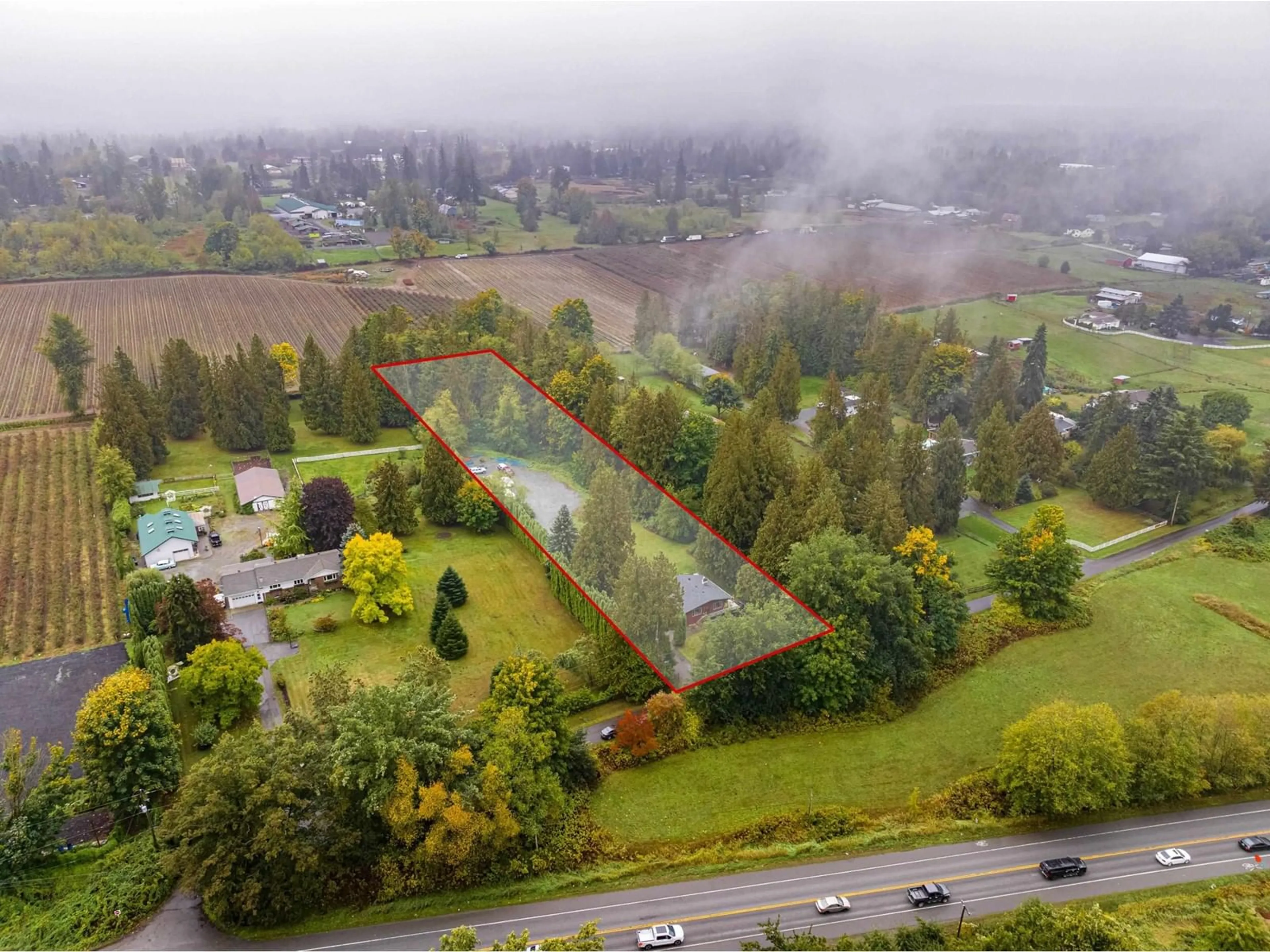 A pic from exterior of the house or condo, the fenced backyard for 25108 36 AVENUE, Langley British Columbia V4W1Z1