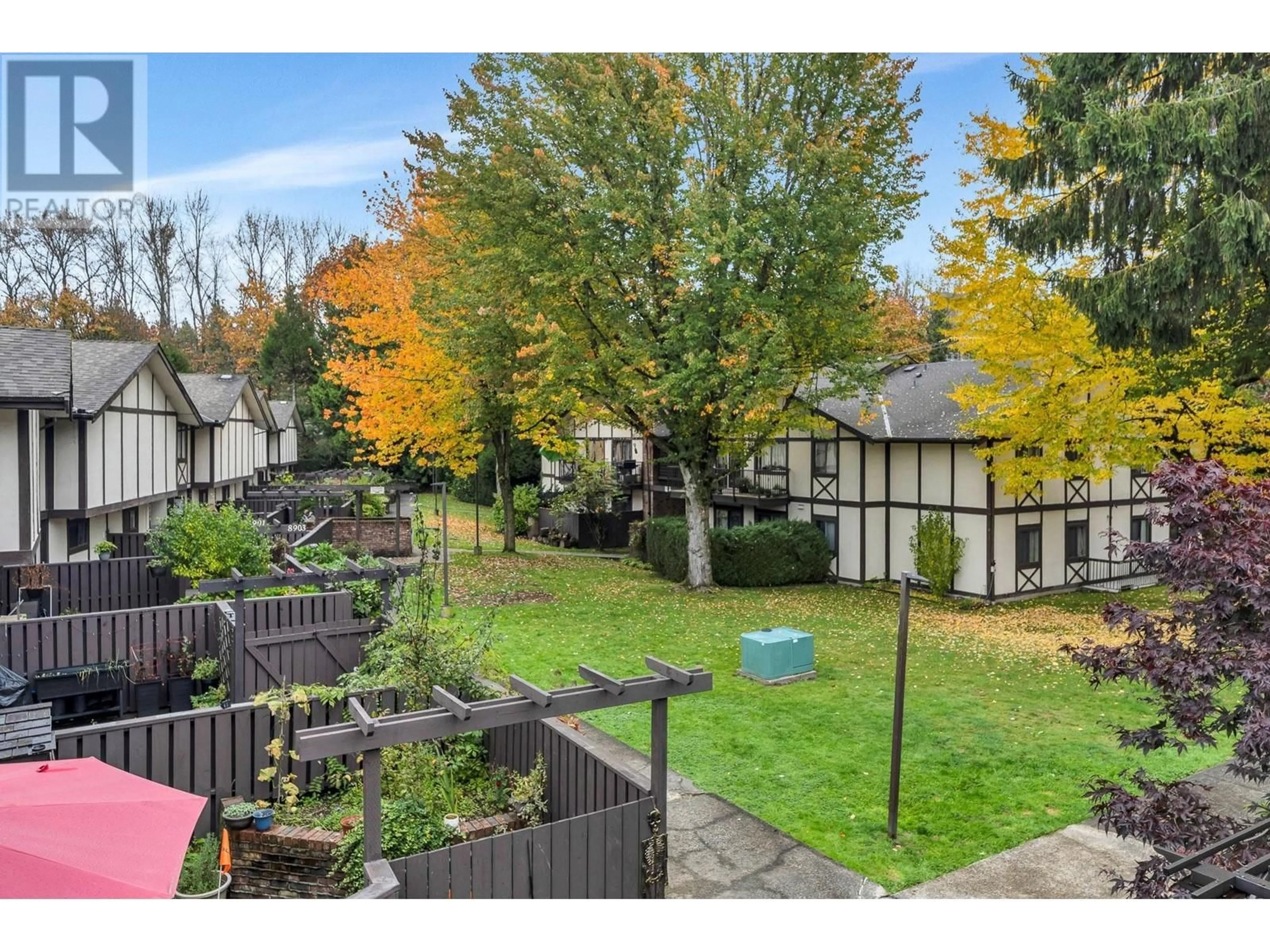 A pic from exterior of the house or condo, the fenced backyard for 8969 HORNE STREET, Burnaby British Columbia V3N4J8