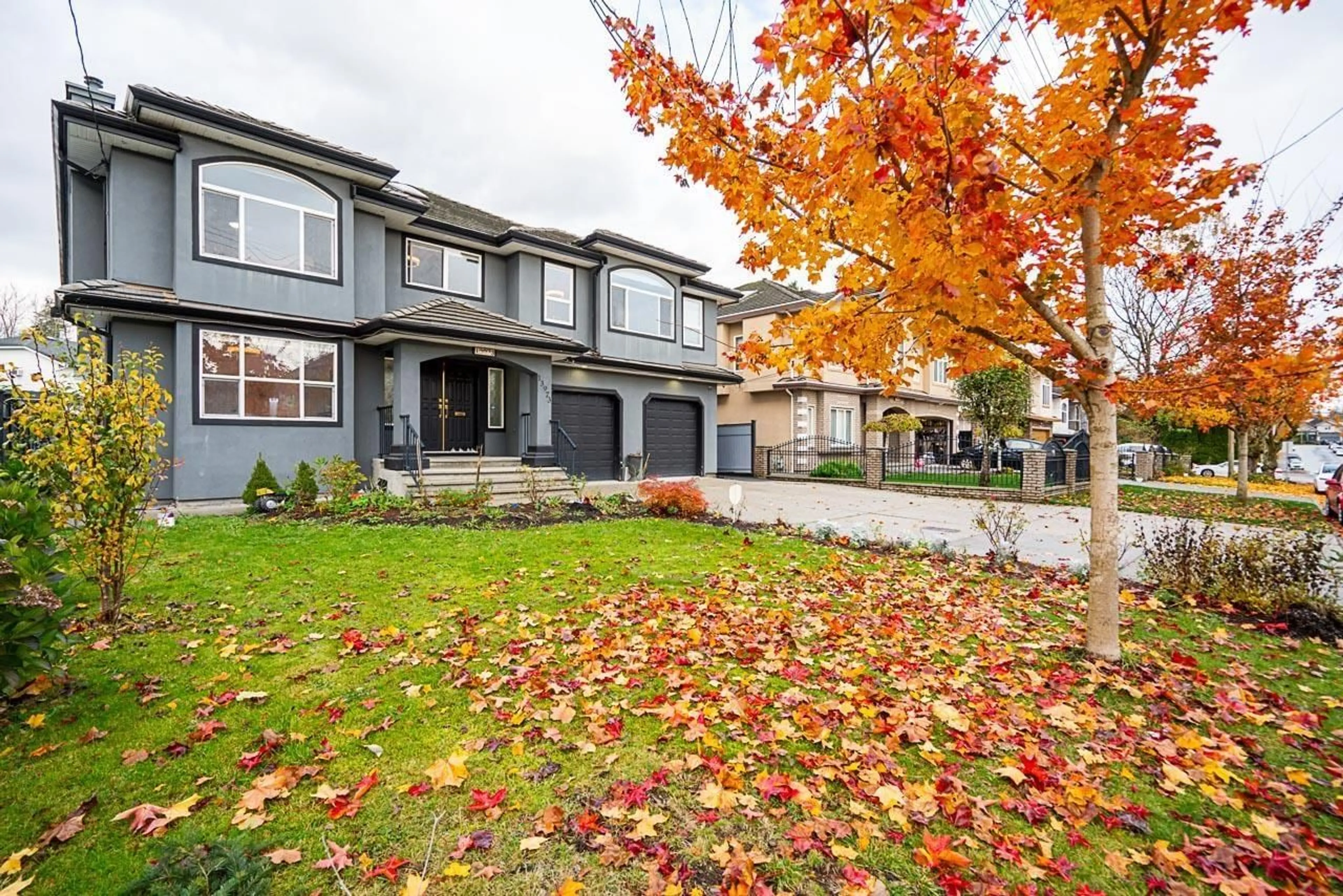 A pic from exterior of the house or condo, the fenced backyard for 13973 90 AVENUE, Surrey British Columbia V3V1C2