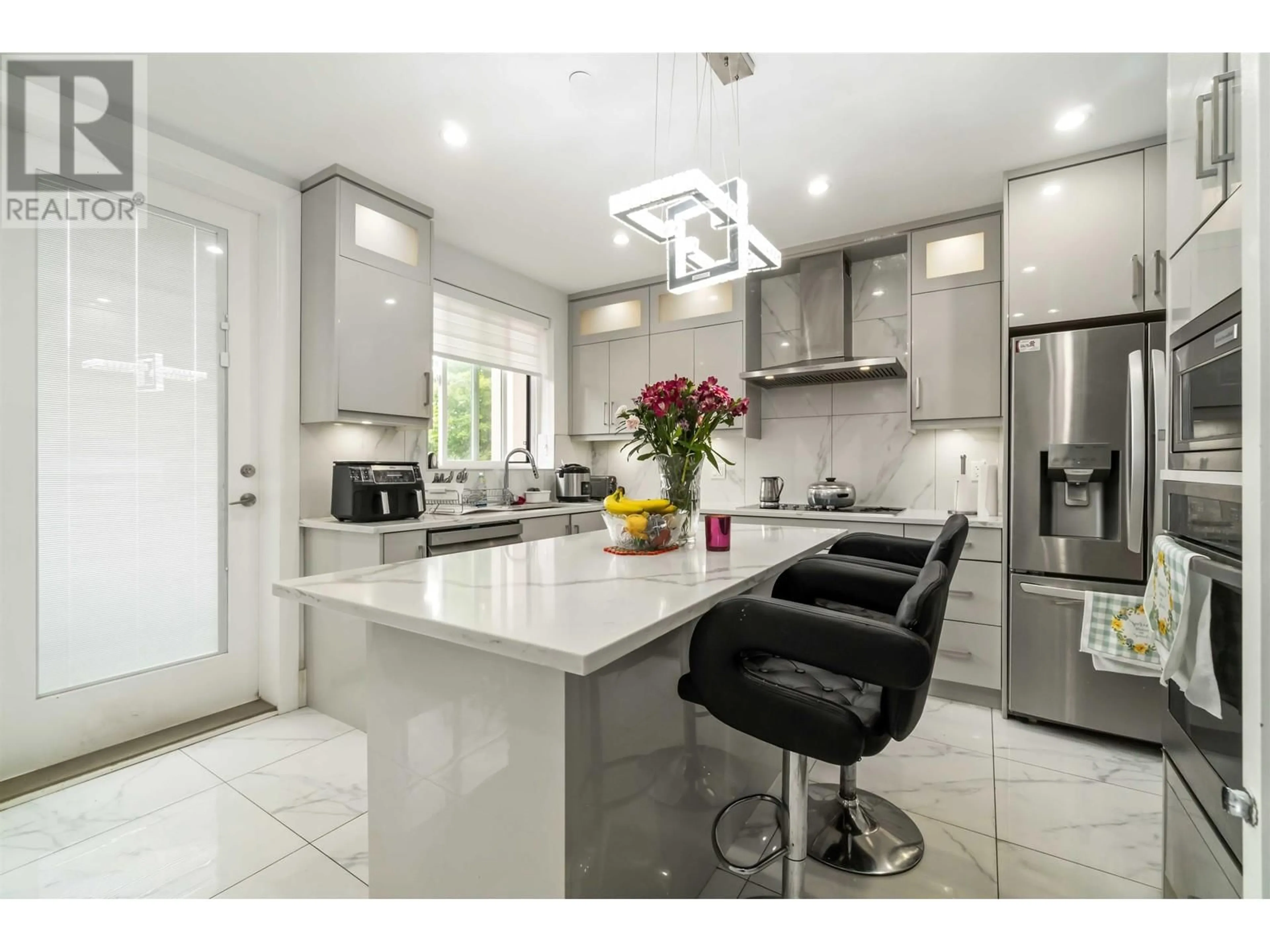 Contemporary kitchen, wood floors for 4841 DUMFRIES STREET, Vancouver British Columbia V5N3T8