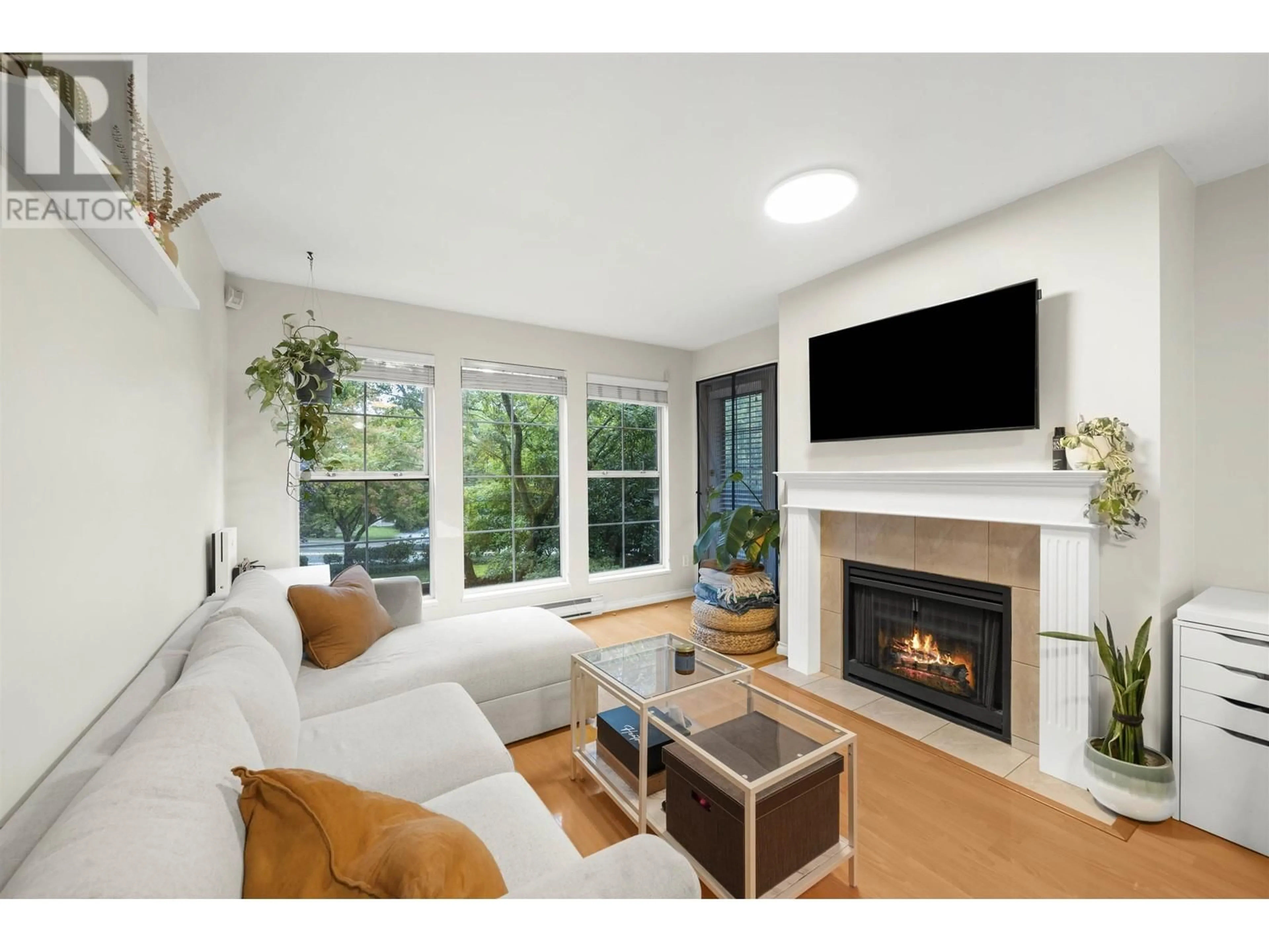 Living room, wood floors for 209 888 GAUTHIER AVENUE, Coquitlam British Columbia V3K6Y1