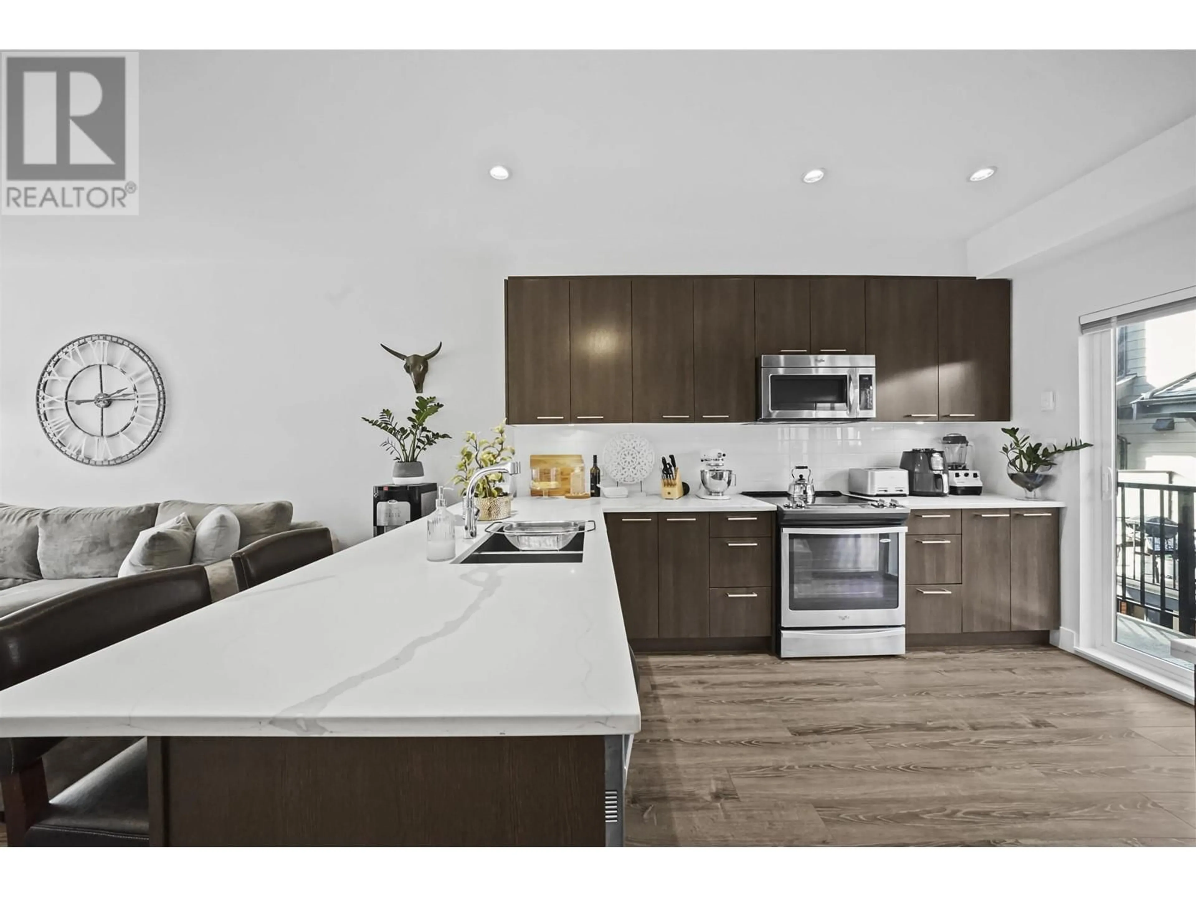 Open concept kitchen for 210 7180 BARNET ROAD, Burnaby British Columbia V5A1C8