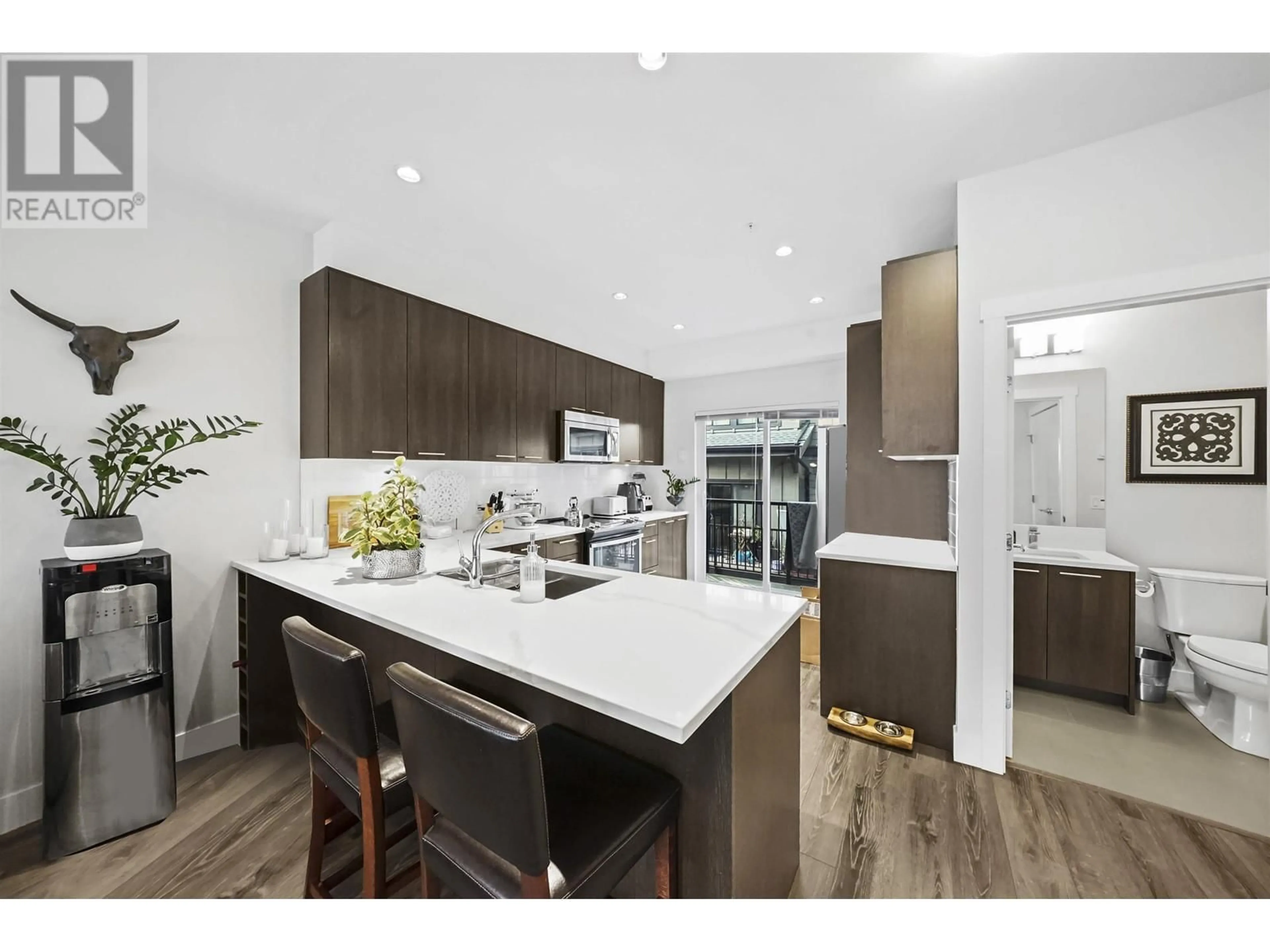 Open concept kitchen for 210 7180 BARNET ROAD, Burnaby British Columbia V5A1C8