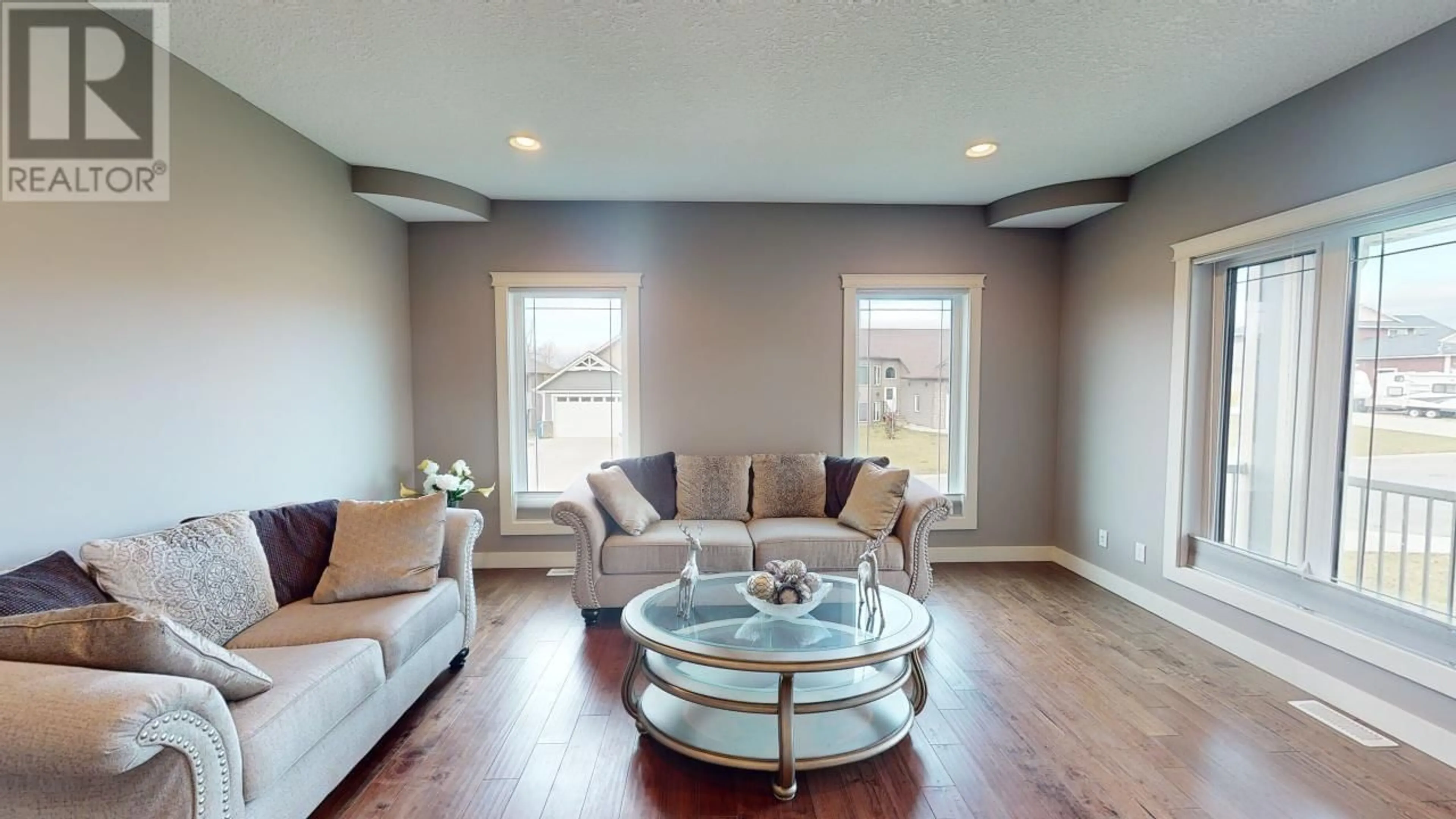 Living room, wood floors for 10712 109 STREET, Fort St. John British Columbia V1J0J3