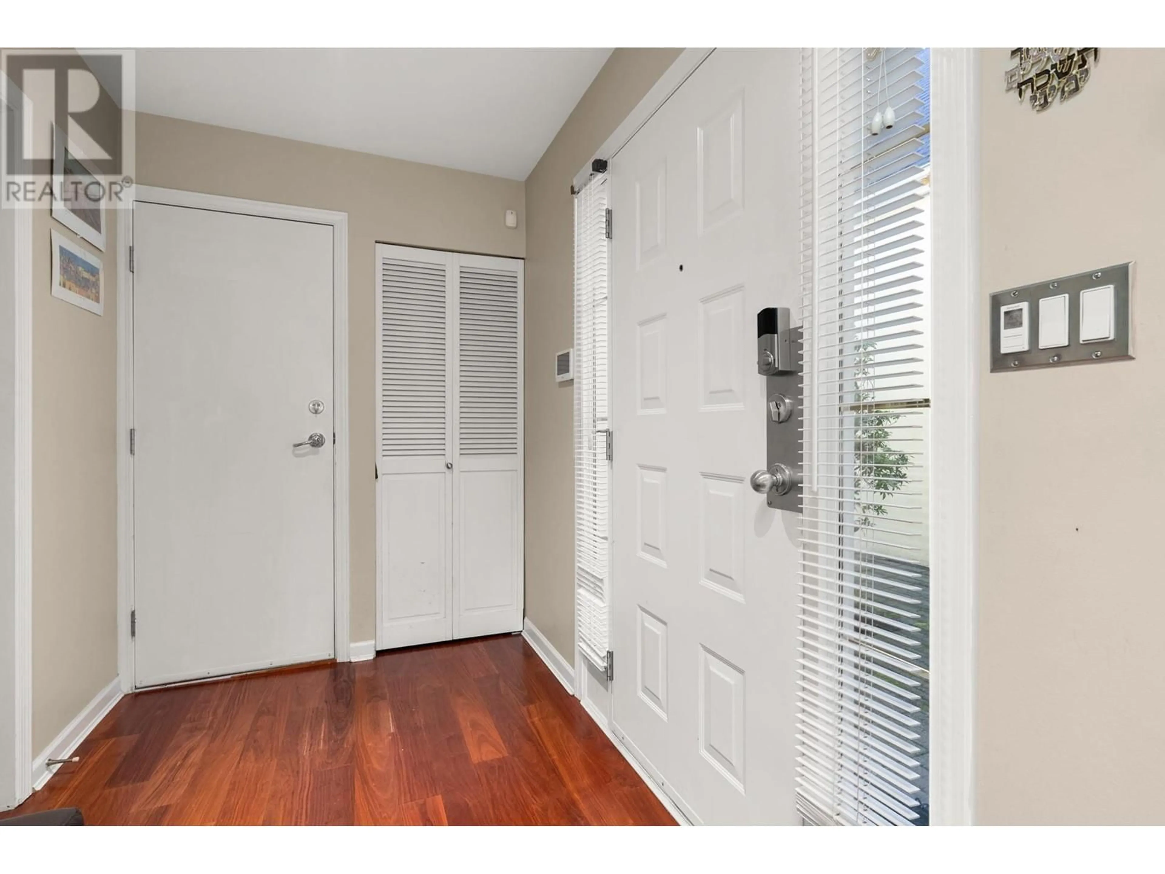 Indoor entryway, wood floors for 8493 PORTSIDE COURT, Vancouver British Columbia V5P4V4