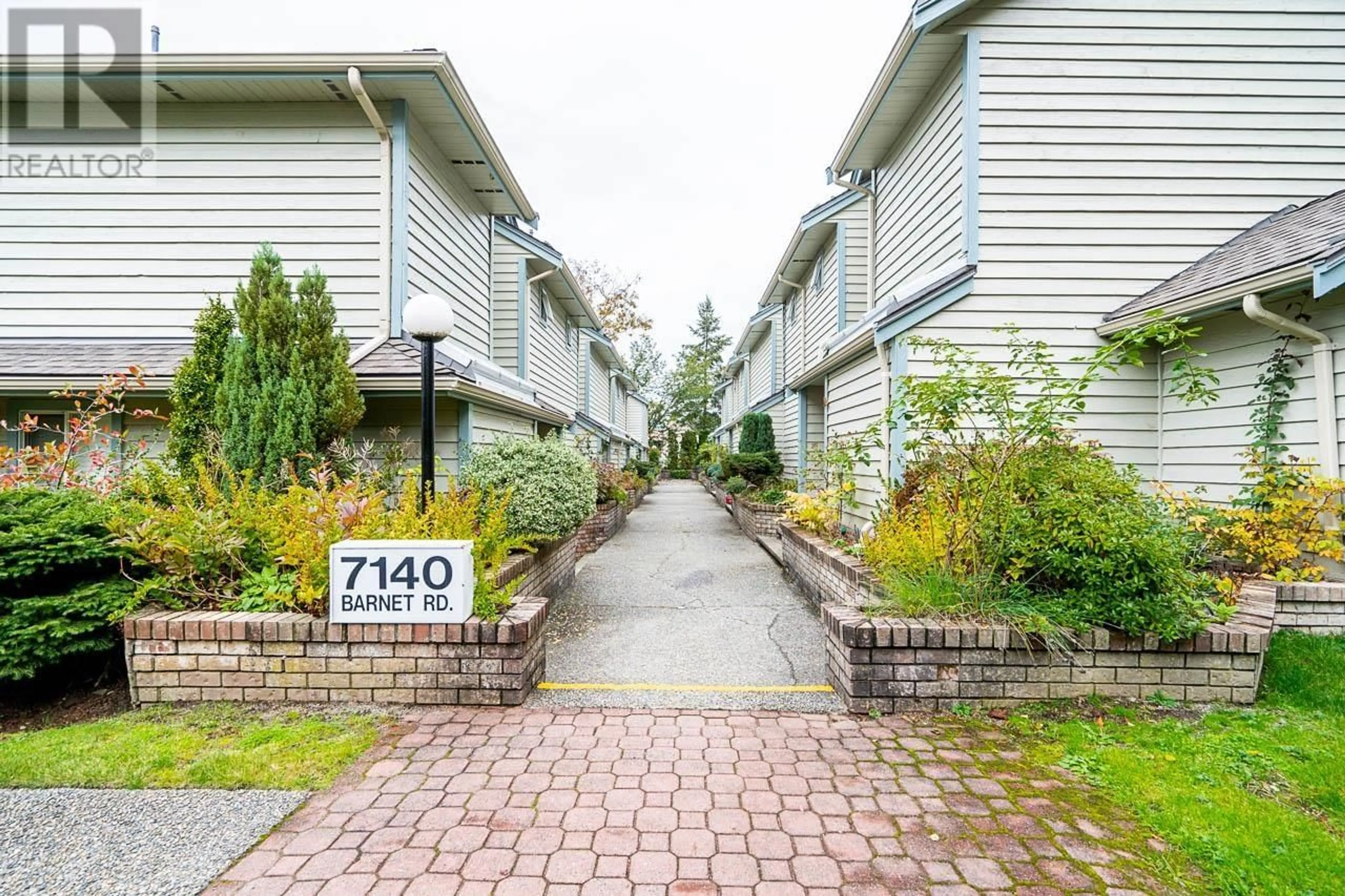 A pic from exterior of the house or condo, the street view for 8 7140 BARNET ROAD, Burnaby British Columbia V5A4S5