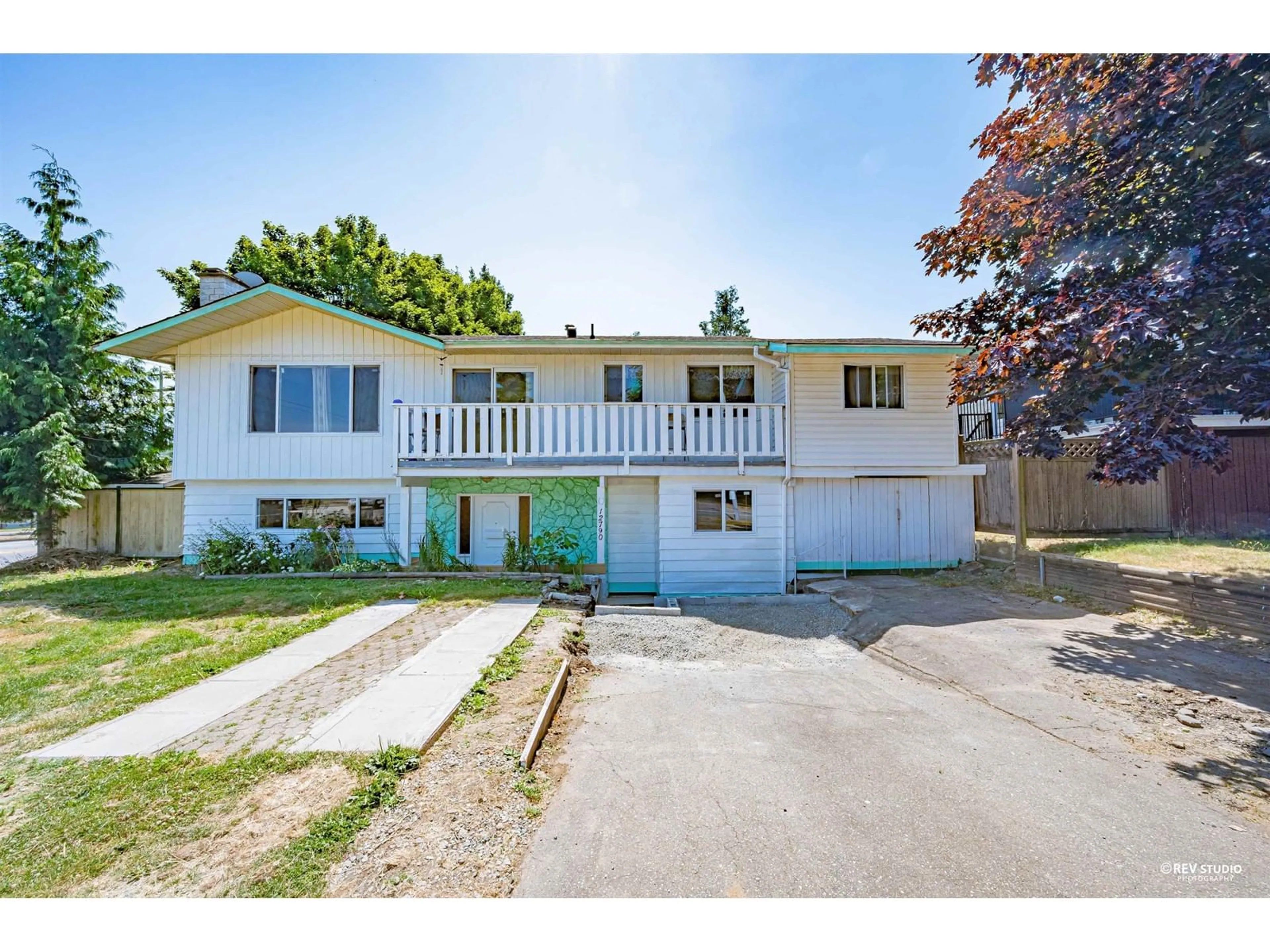 A pic from outside/outdoor area/front of a property/back of a property/a pic from drone, street for 12790 92, Surrey British Columbia V3V6T8
