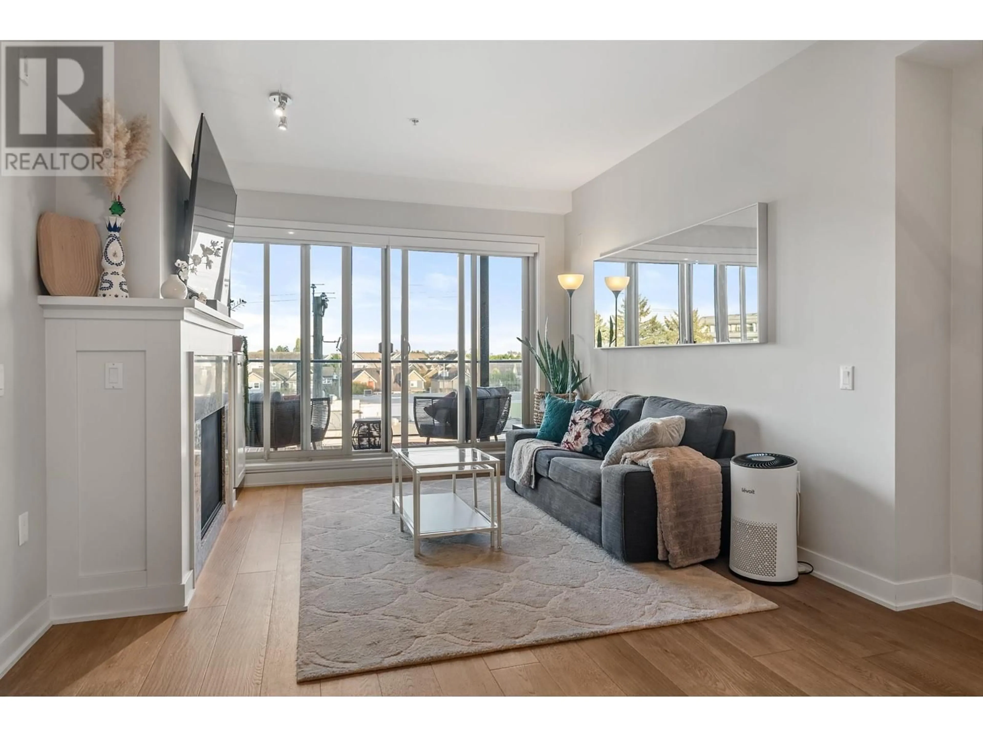 Living room, wood floors for 311 6168 LONDON ROAD, Richmond British Columbia V7E3S3