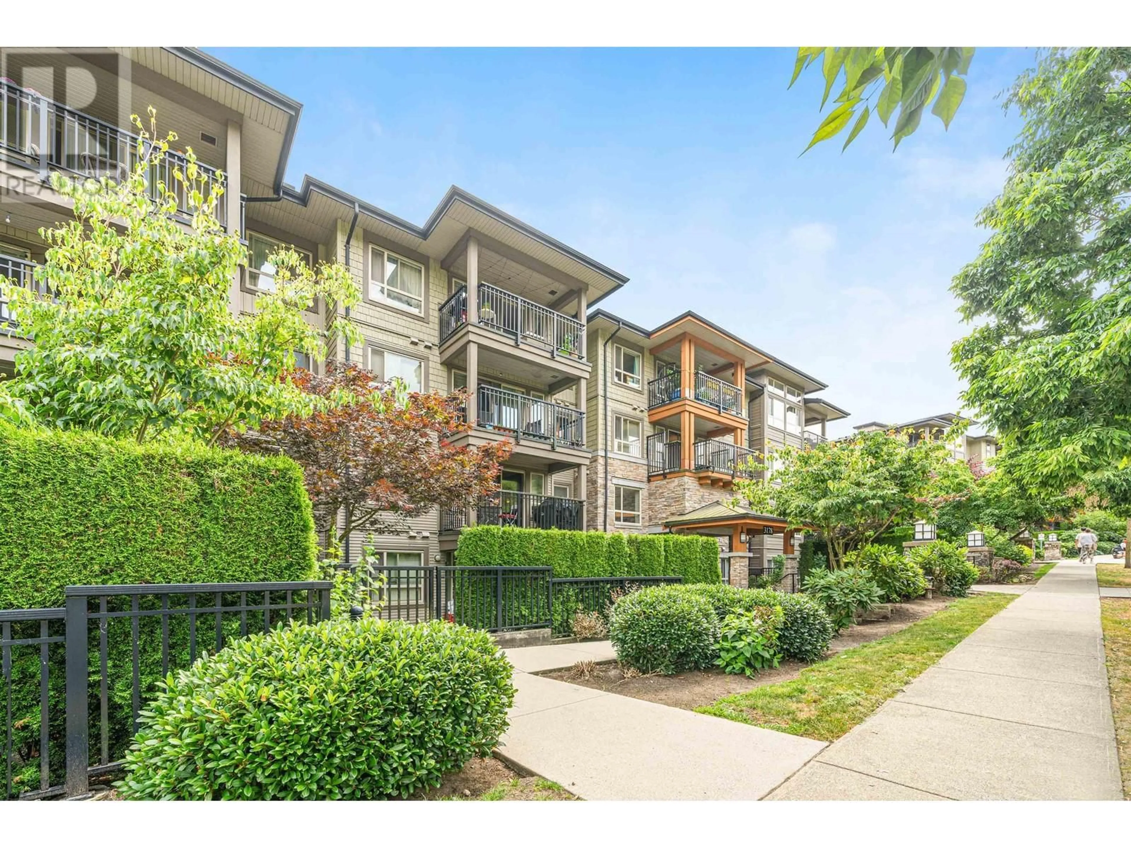 A pic from exterior of the house or condo, the street view for 522 3178 DAYANEE SPRINGS BOULEVARD, Coquitlam British Columbia V3E0B9