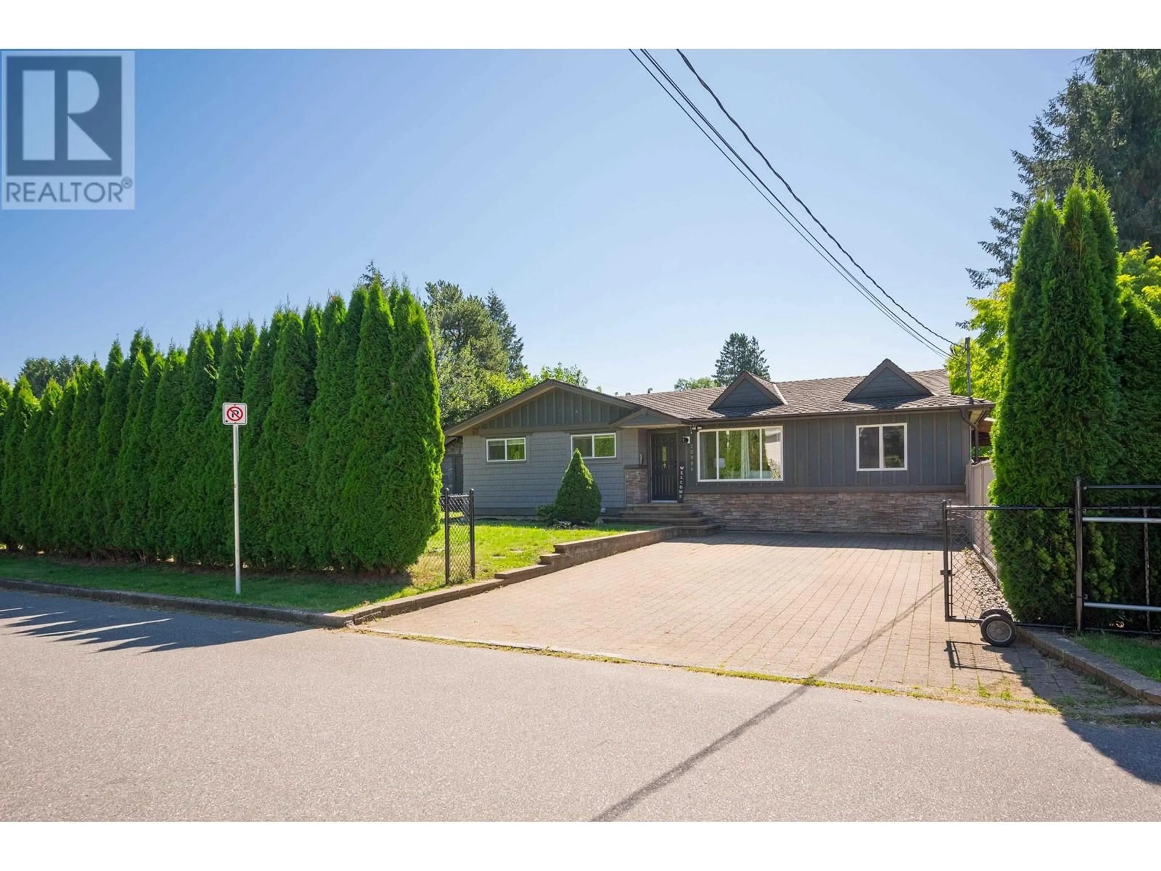 Frontside or backside of a home, the street view for 20984 118 AVENUE, Maple Ridge British Columbia V2X2M7