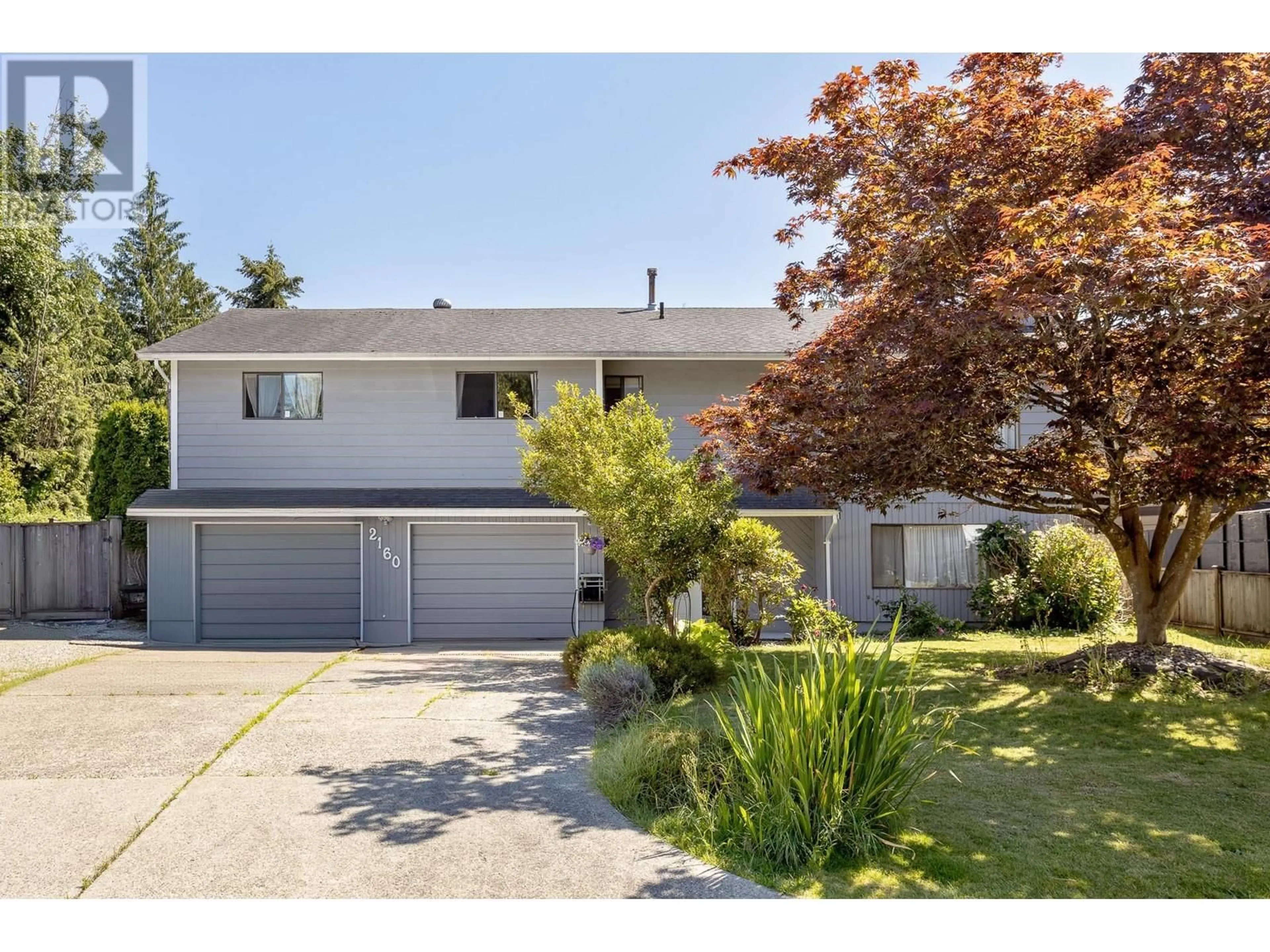 Frontside or backside of a home, the fenced backyard for 2160 DORSET AVENUE, Port Coquitlam British Columbia V3B5B9