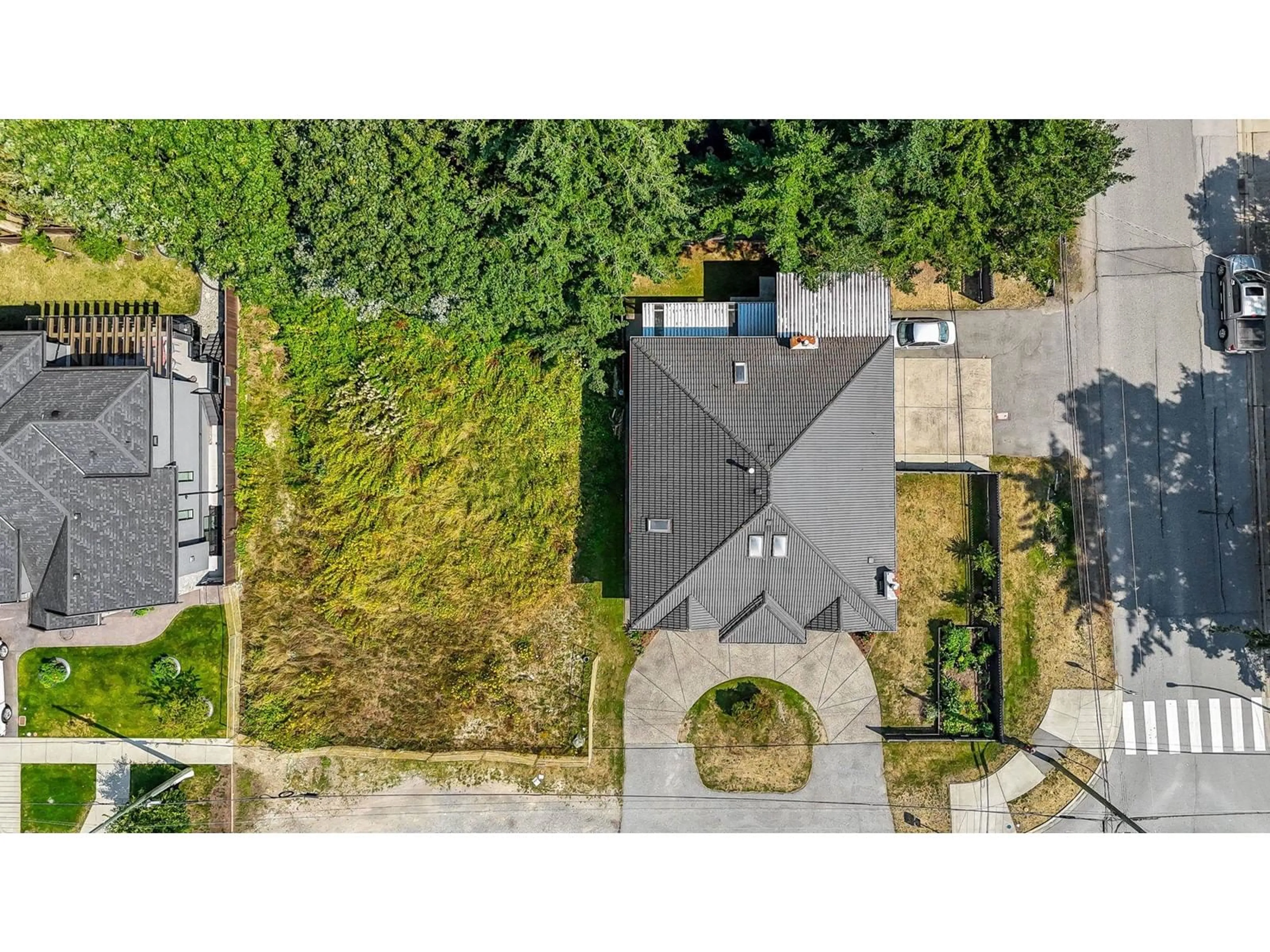 Frontside or backside of a home, the fenced backyard for 6222 133 STREET, Surrey British Columbia V3X1M2