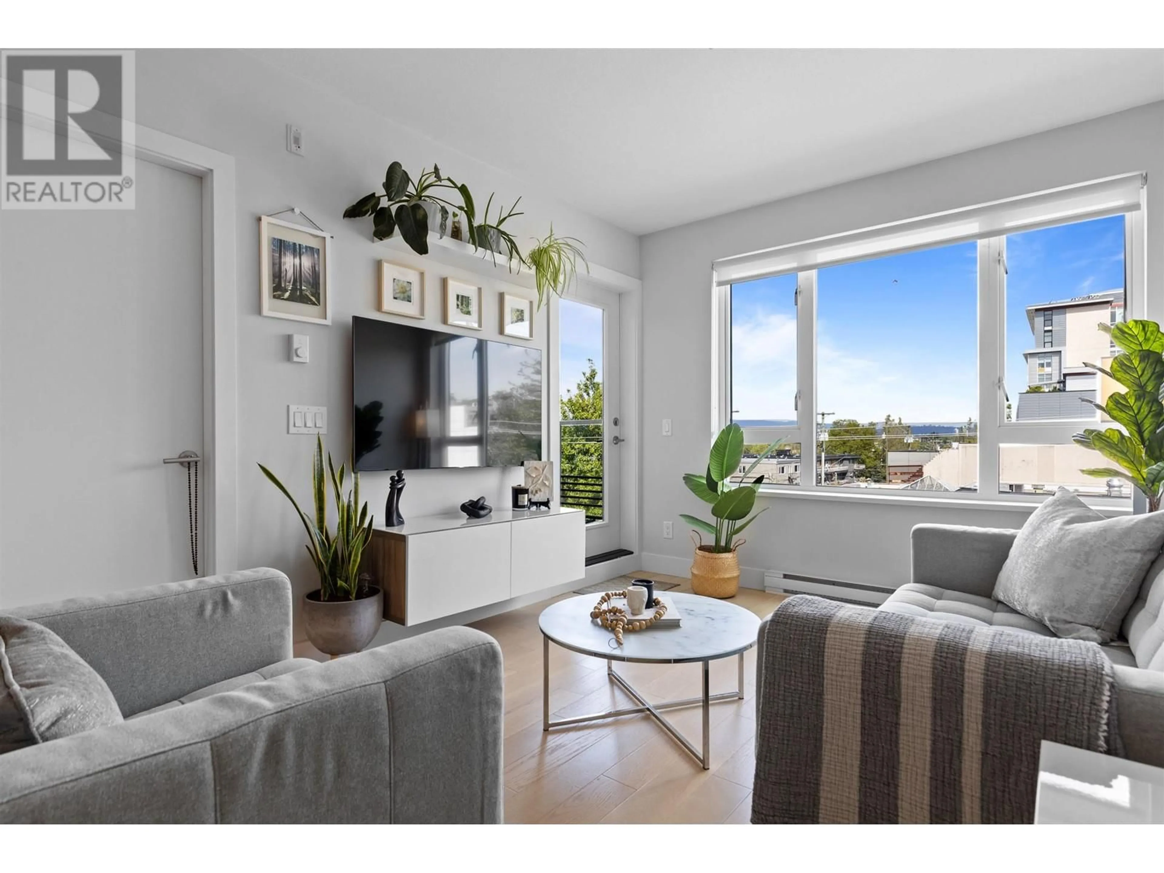 Living room, wood floors for 503 2477 CAROLINA STREET, Vancouver British Columbia V5T3S8