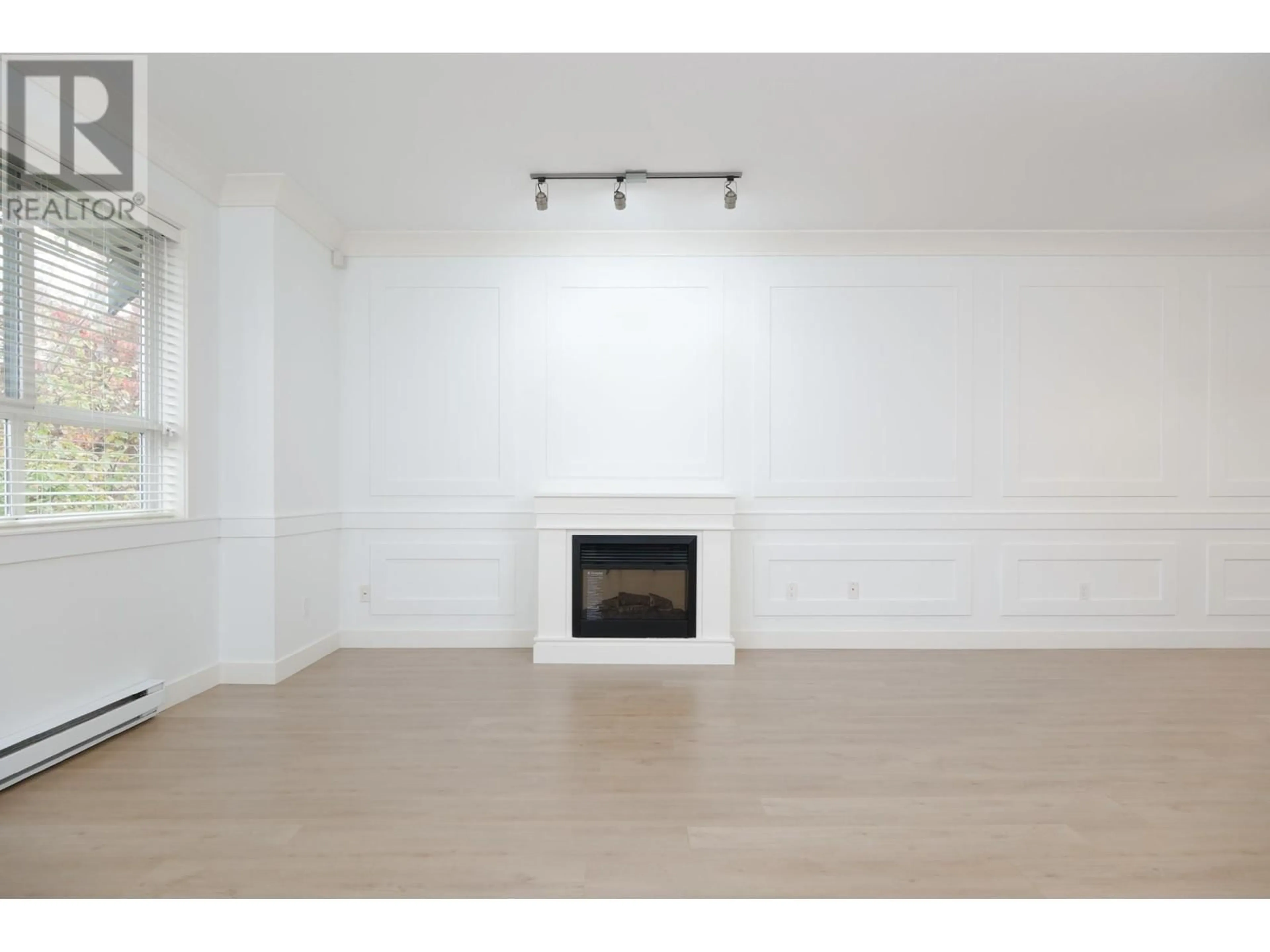 A pic of a room, wood floors for 7 11393 STEVESTON HIGHWAY, Richmond British Columbia V7A1N8