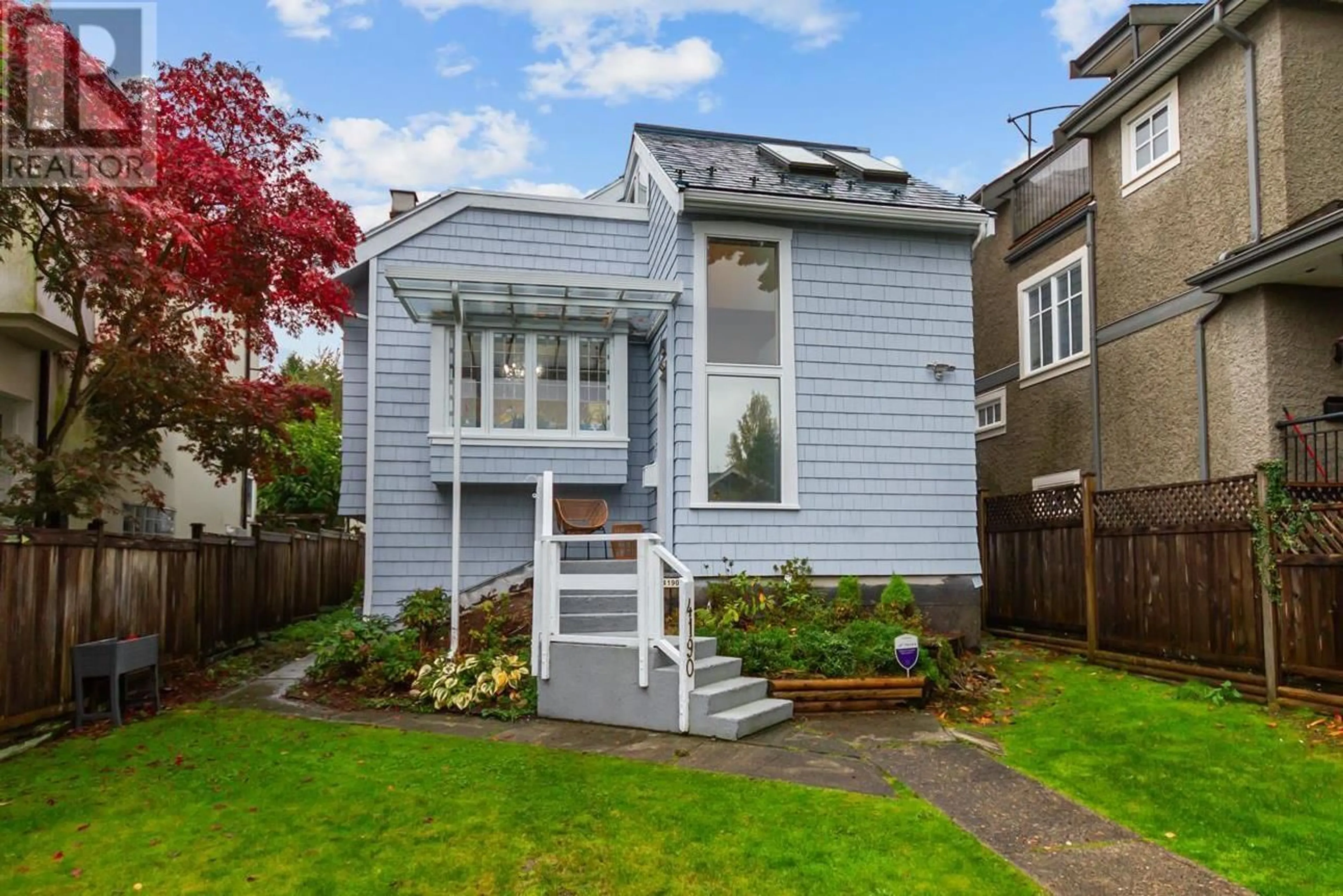 Frontside or backside of a home, the fenced backyard for 4190 W 11TH AVENUE, Vancouver British Columbia V6R2L6