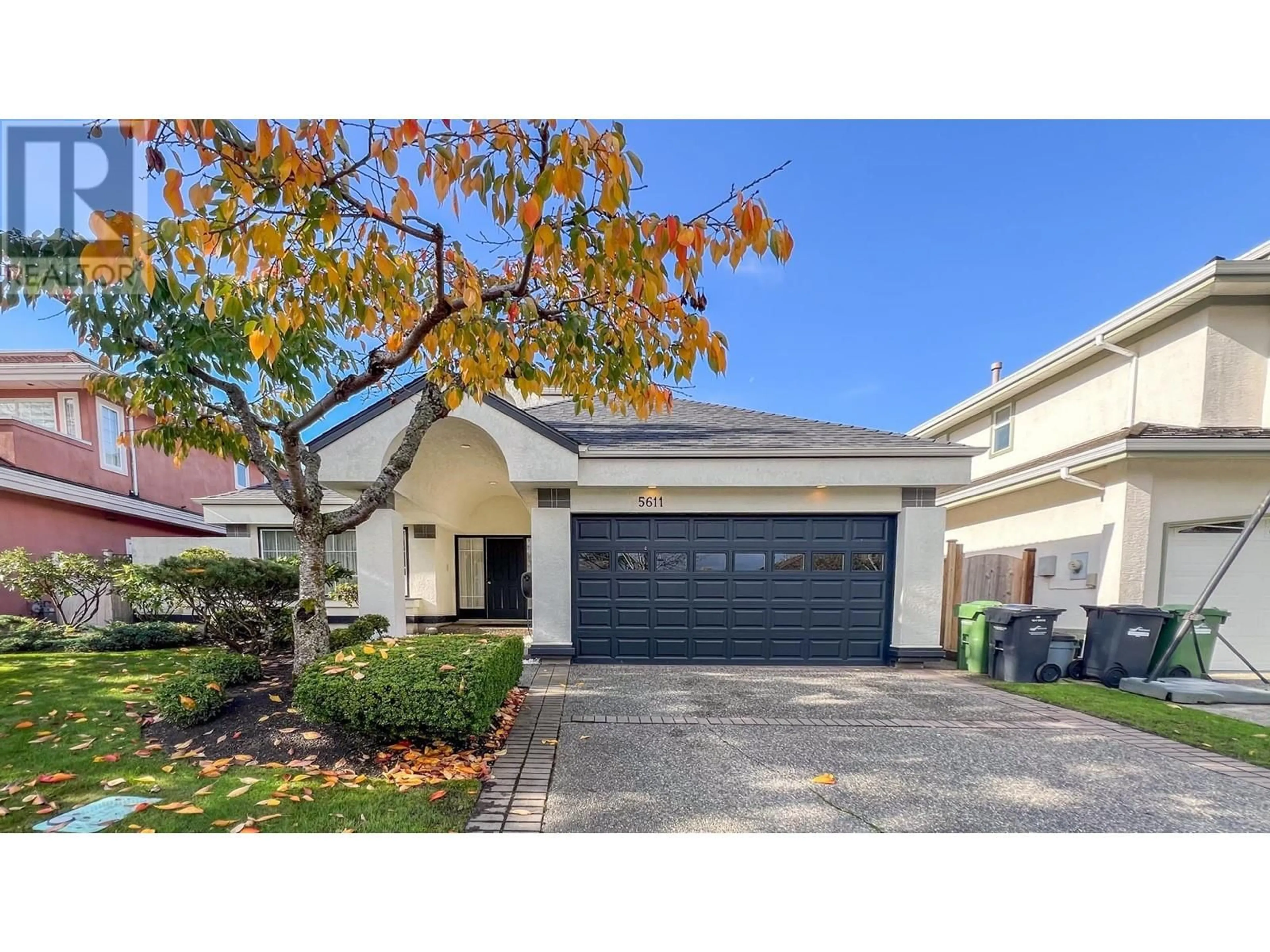 Frontside or backside of a home, the street view for 5611 BARNARD DRIVE, Richmond British Columbia V7C5N4