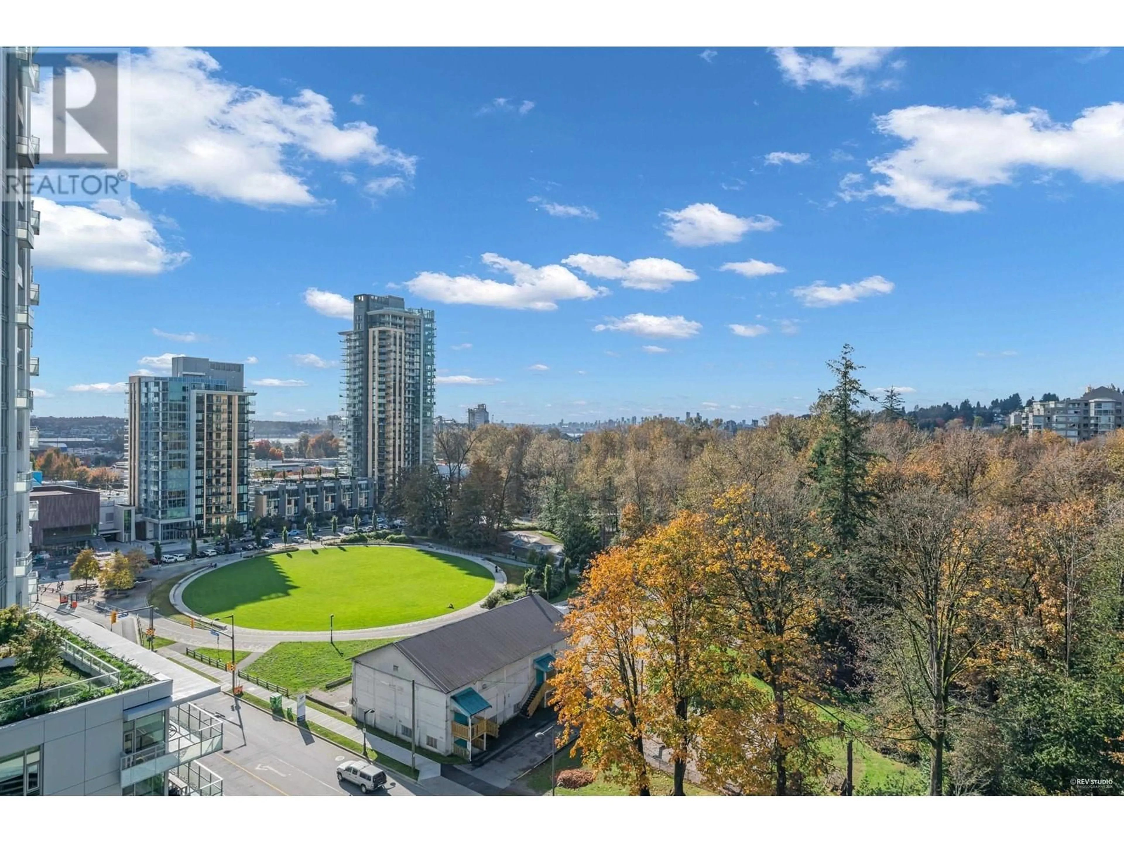 A pic from exterior of the house or condo, the fenced backyard for 1105 680 SEYLYNN CRESCENT, North Vancouver British Columbia V7J0B5