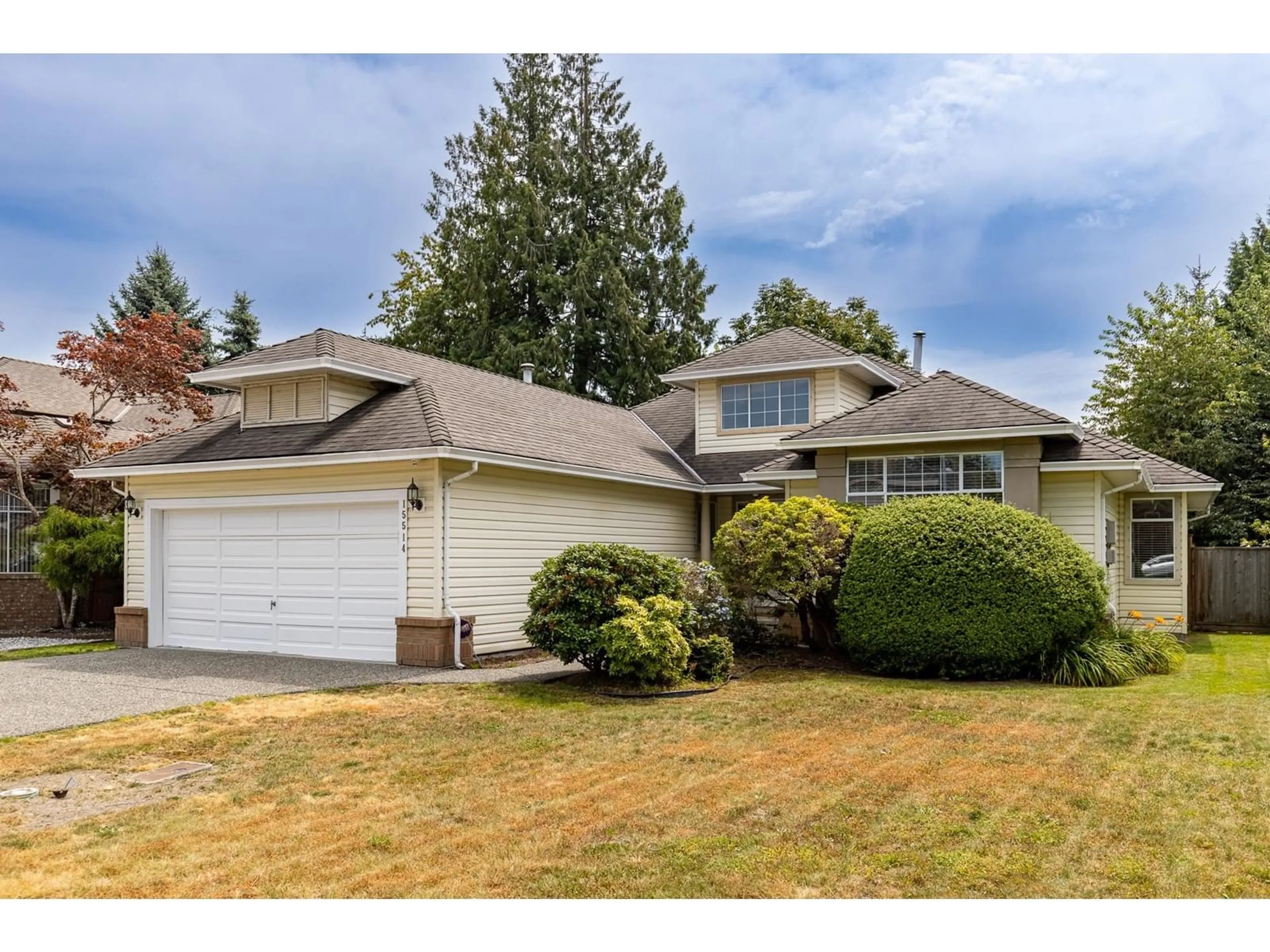 Frontside or backside of a home, the fenced backyard for 15514 108 AVENUE, Surrey British Columbia V3R0M2