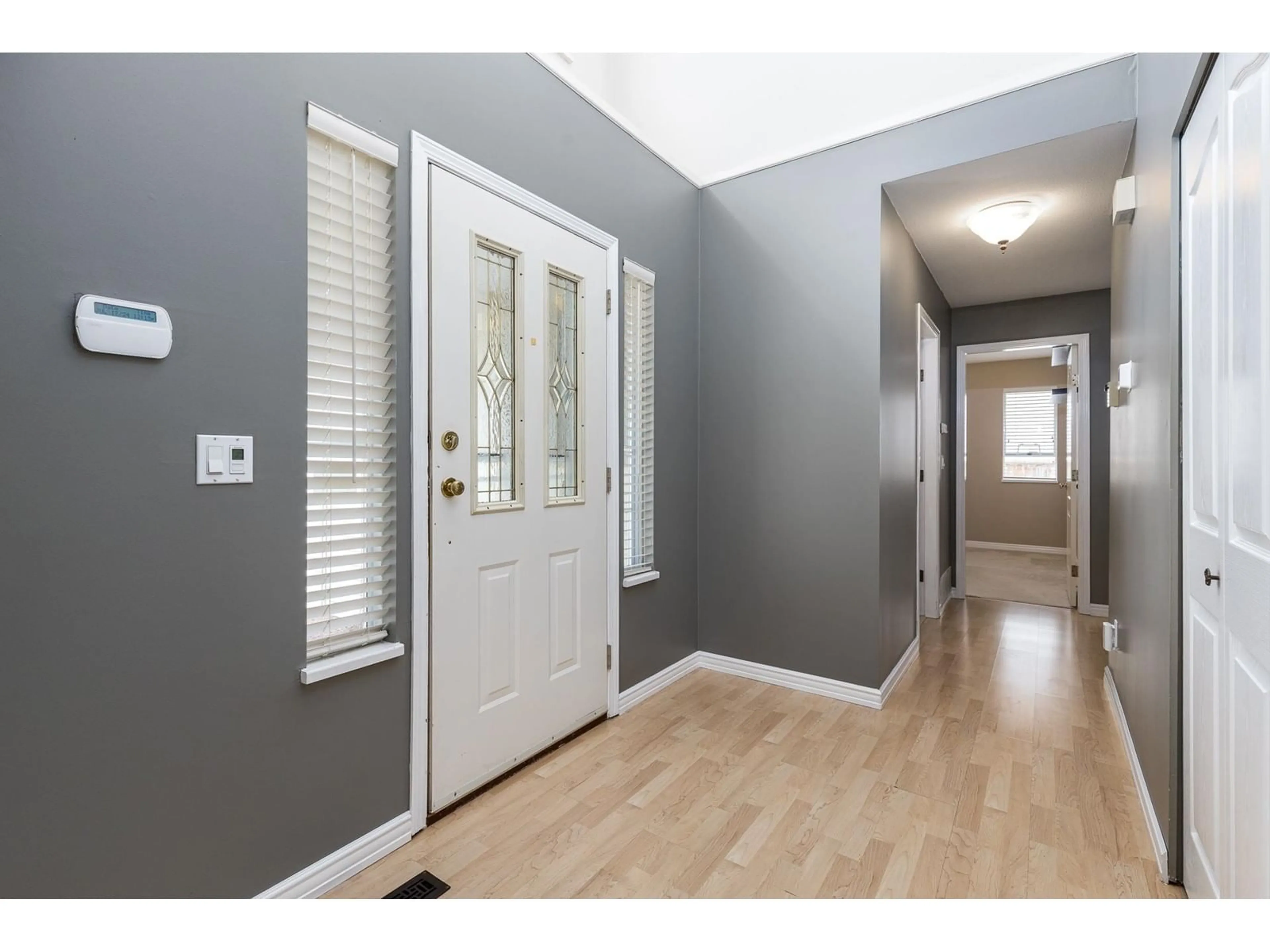 Indoor entryway, wood floors for 15514 108 AVENUE, Surrey British Columbia V3R0M2