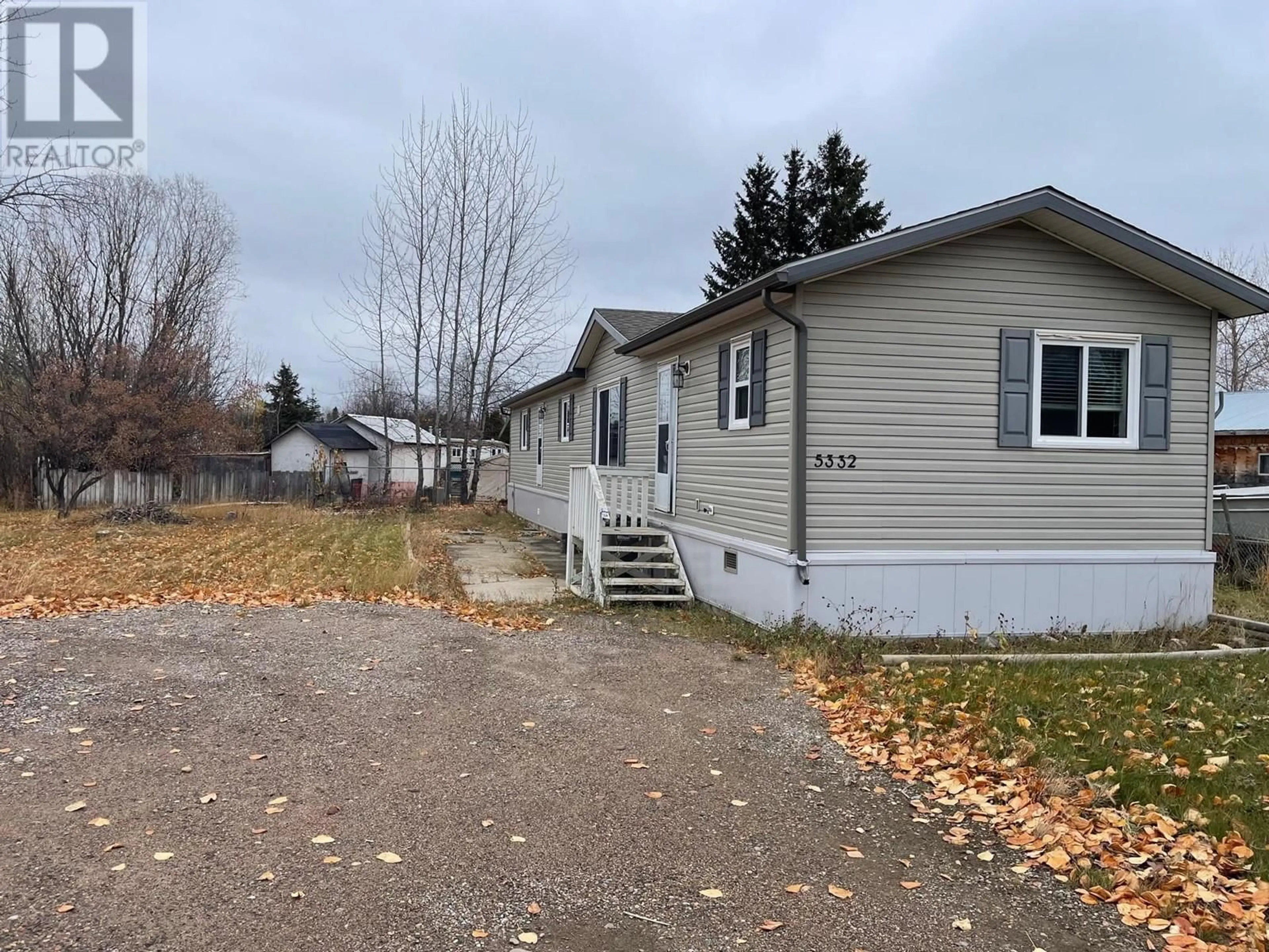 Frontside or backside of a home, cottage for 5332 42 STREET, Fort Nelson British Columbia V0C1R0