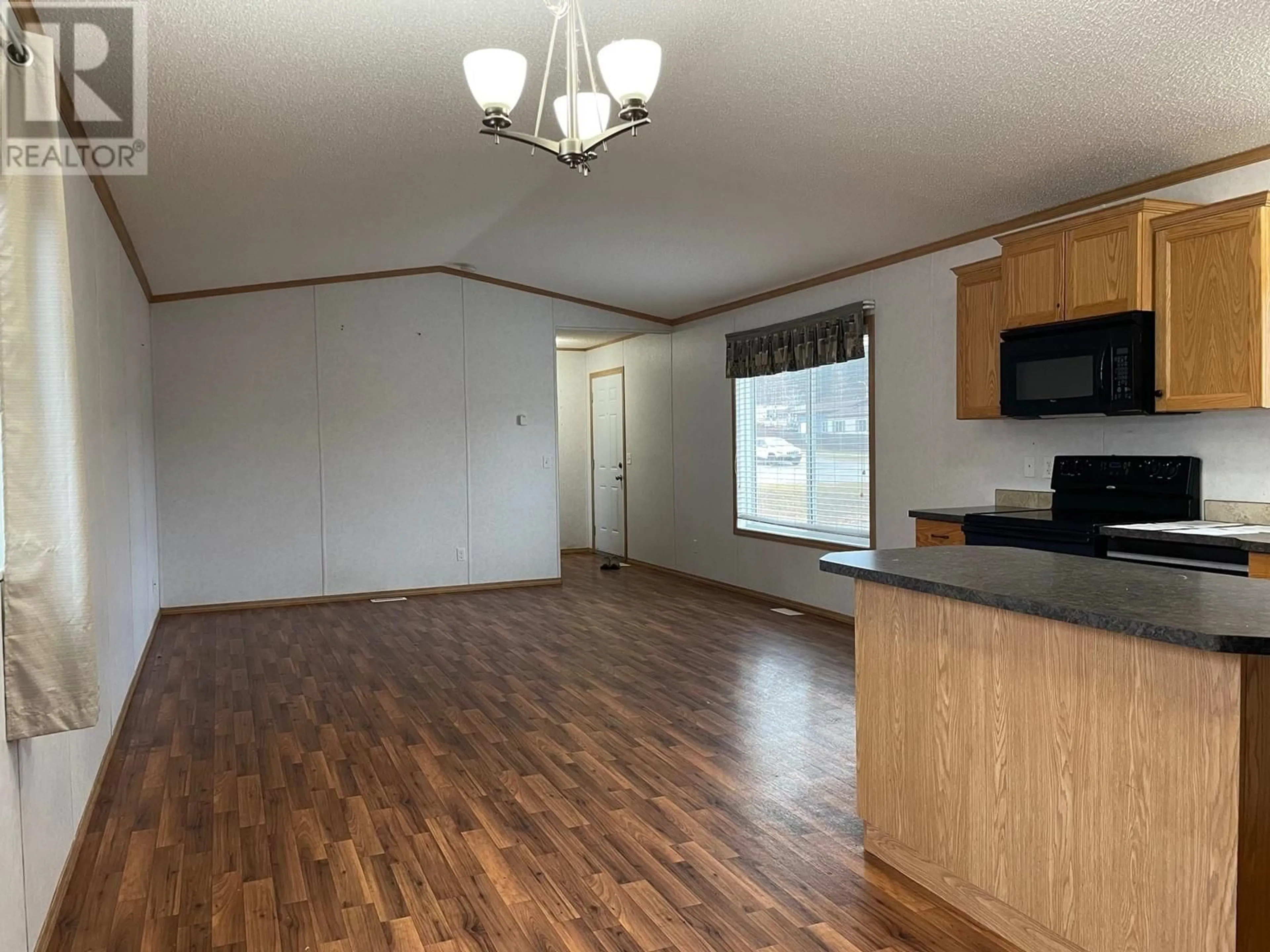 A pic of a room, wood floors for 5332 42 STREET, Fort Nelson British Columbia V0C1R0