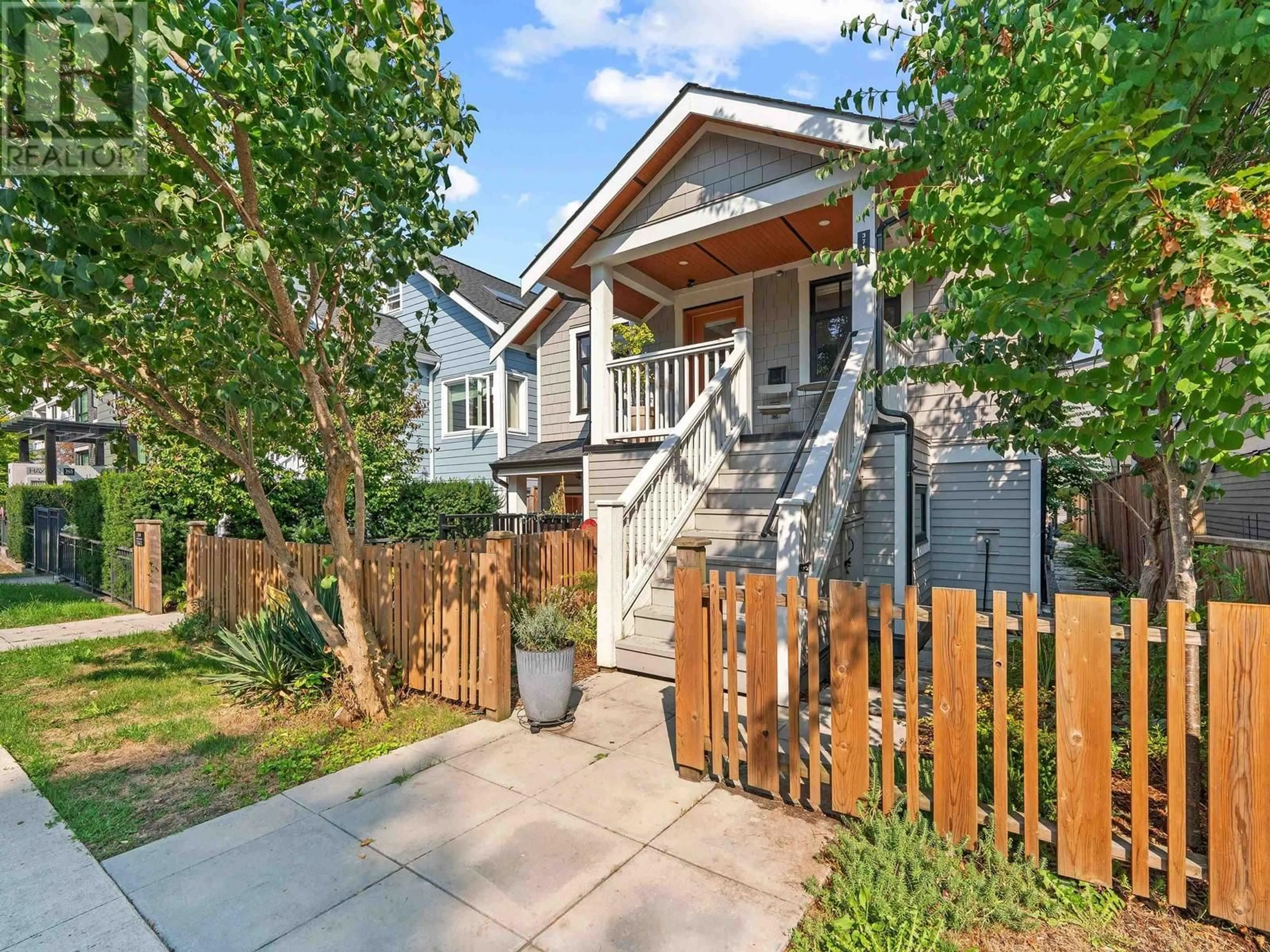 Frontside or backside of a home, the fenced backyard for 371 E 16TH AVENUE, Vancouver British Columbia V5T2T7