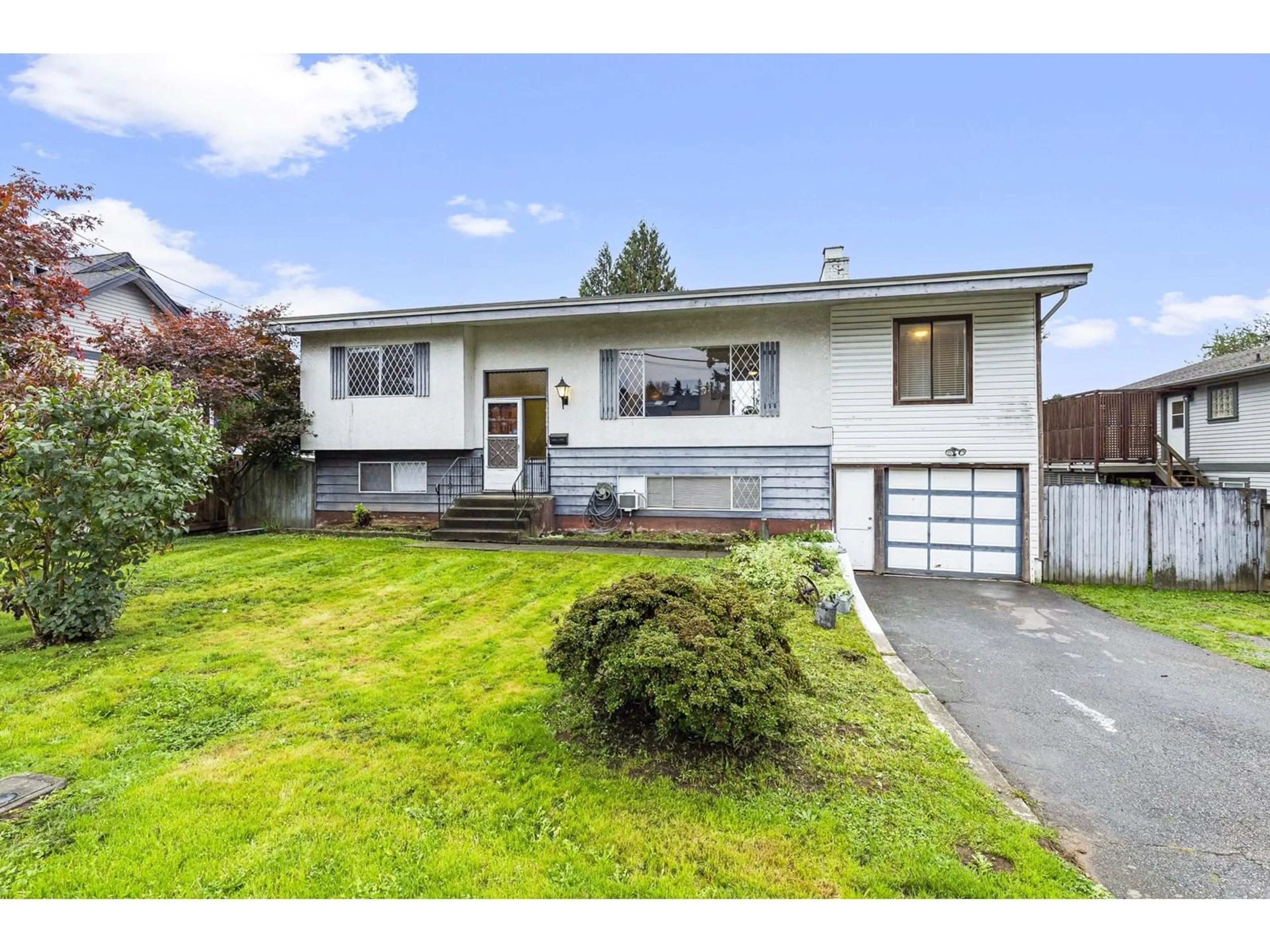 Frontside or backside of a home, the fenced backyard for 34540 FERGUSON AVENUE, Mission British Columbia V2V6P7