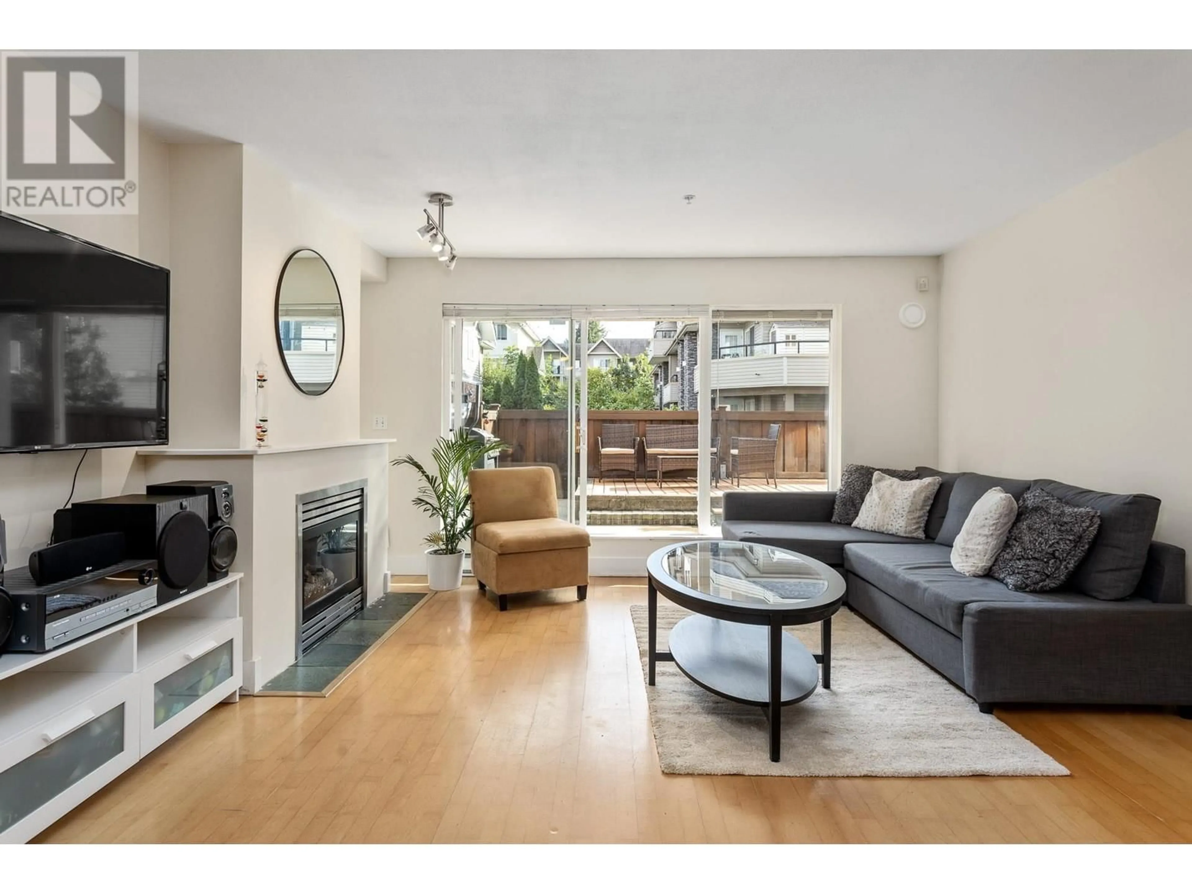 Living room, wood floors for 110 1570 PRAIRIE AVENUE, Port Coquitlam British Columbia V3B1T4