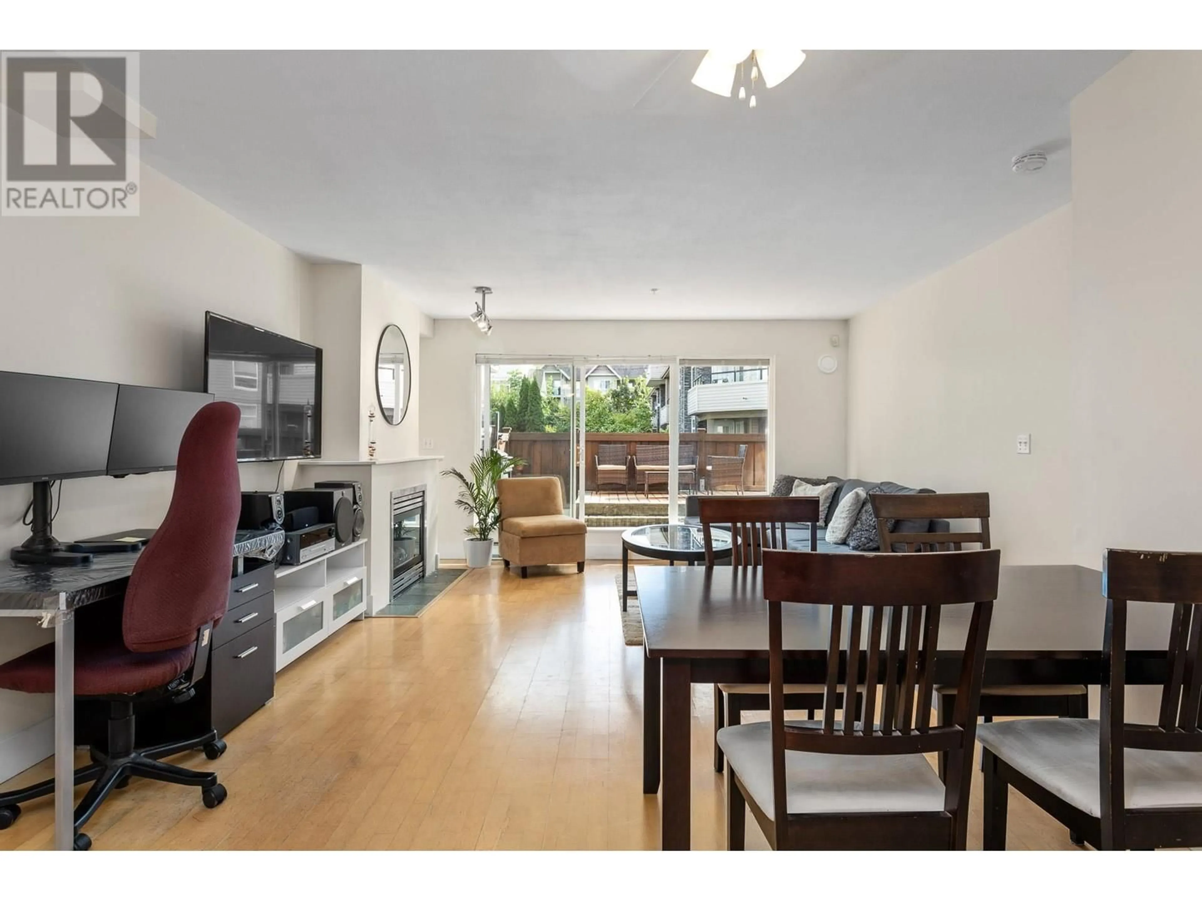 Living room, wood floors for 110 1570 PRAIRIE AVENUE, Port Coquitlam British Columbia V3B1T4