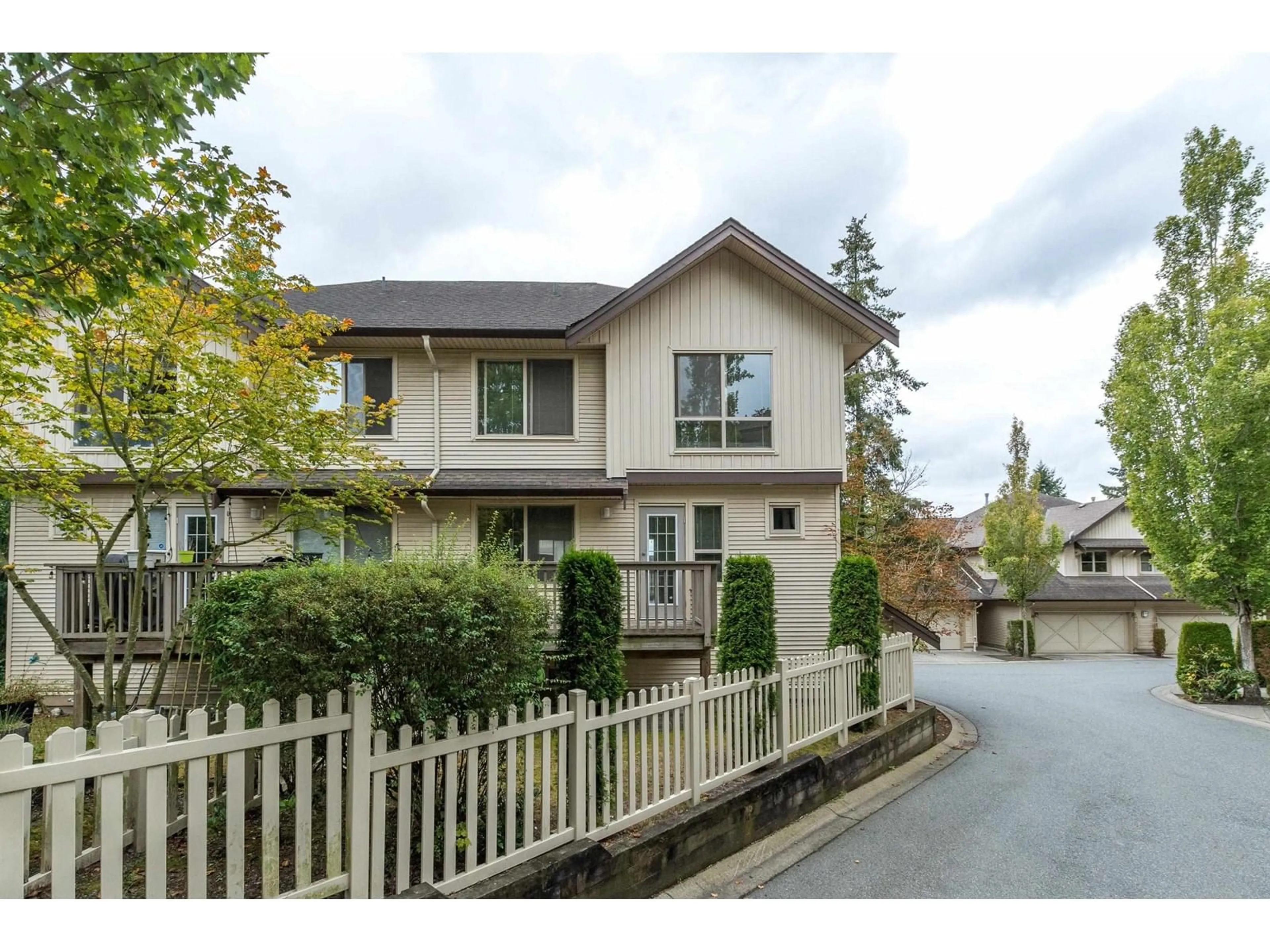 A pic from exterior of the house or condo, the fenced backyard for 89 20350 68 AVENUE, Langley British Columbia V2Y3A5