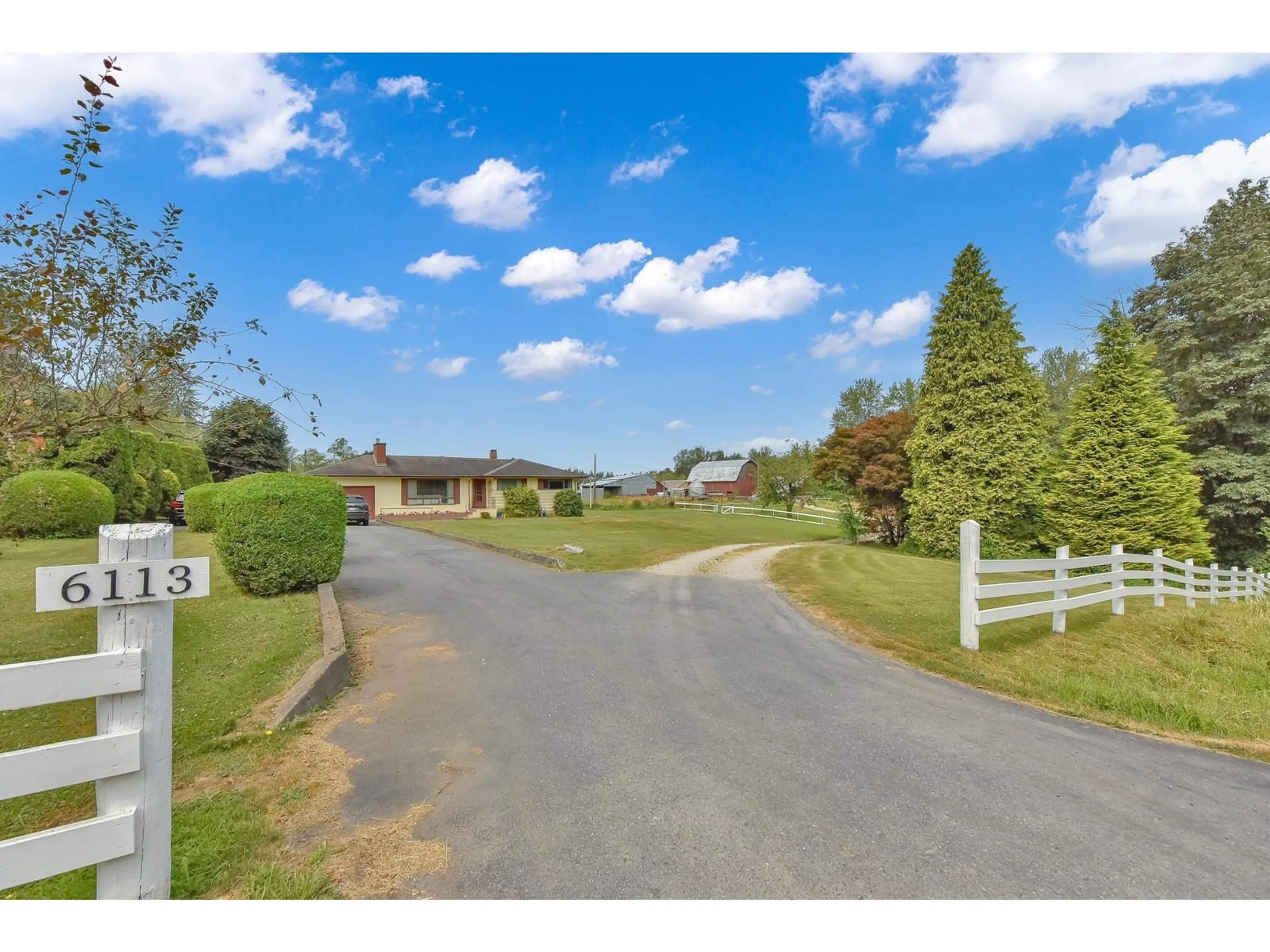 Frontside or backside of a home, the fenced backyard for 6113 256 STREET, Langley British Columbia V4W1K1