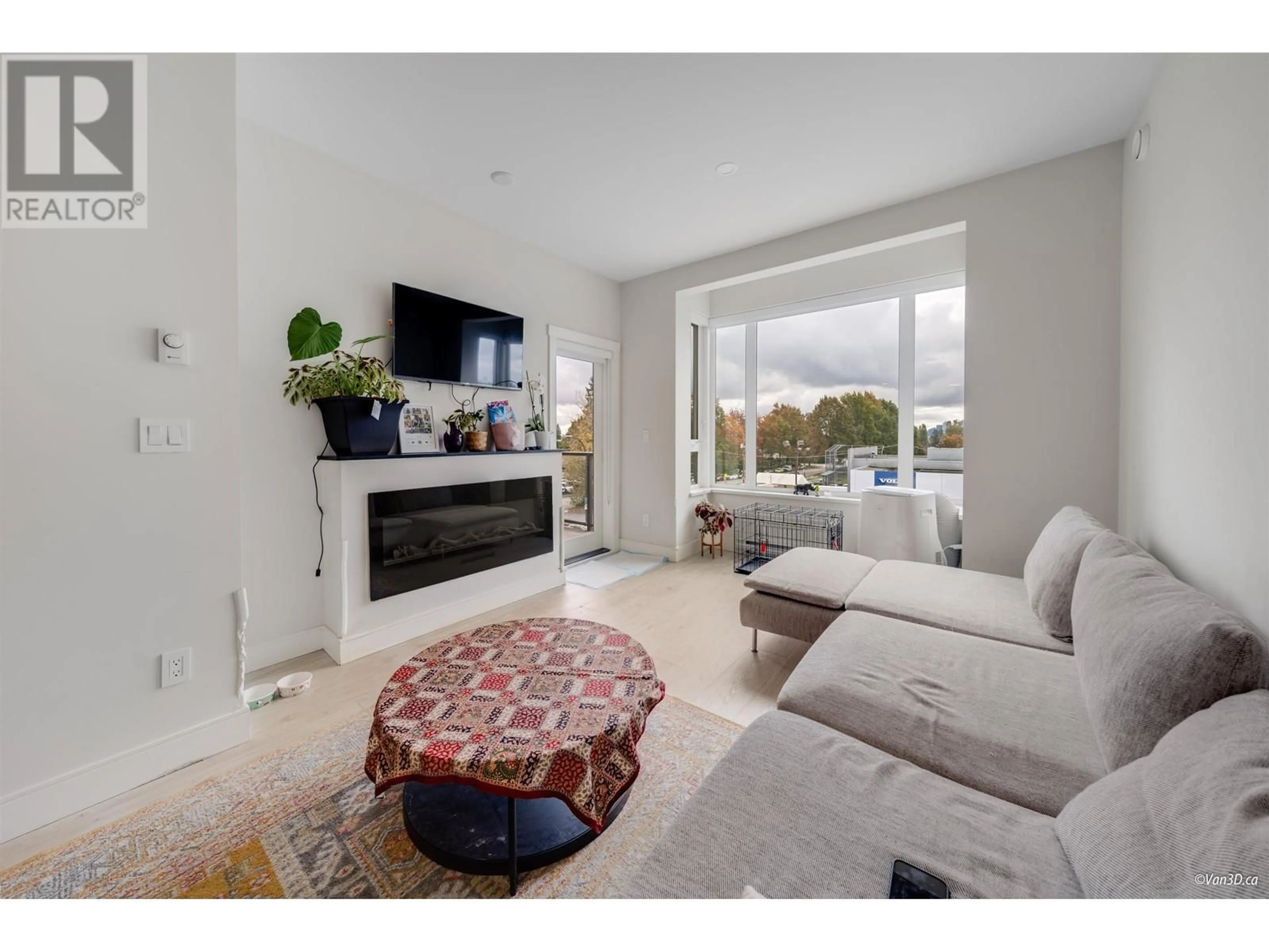 Living room, wood floors for 311 1633 TATLOW AVENUE, North Vancouver British Columbia V7P2Z8