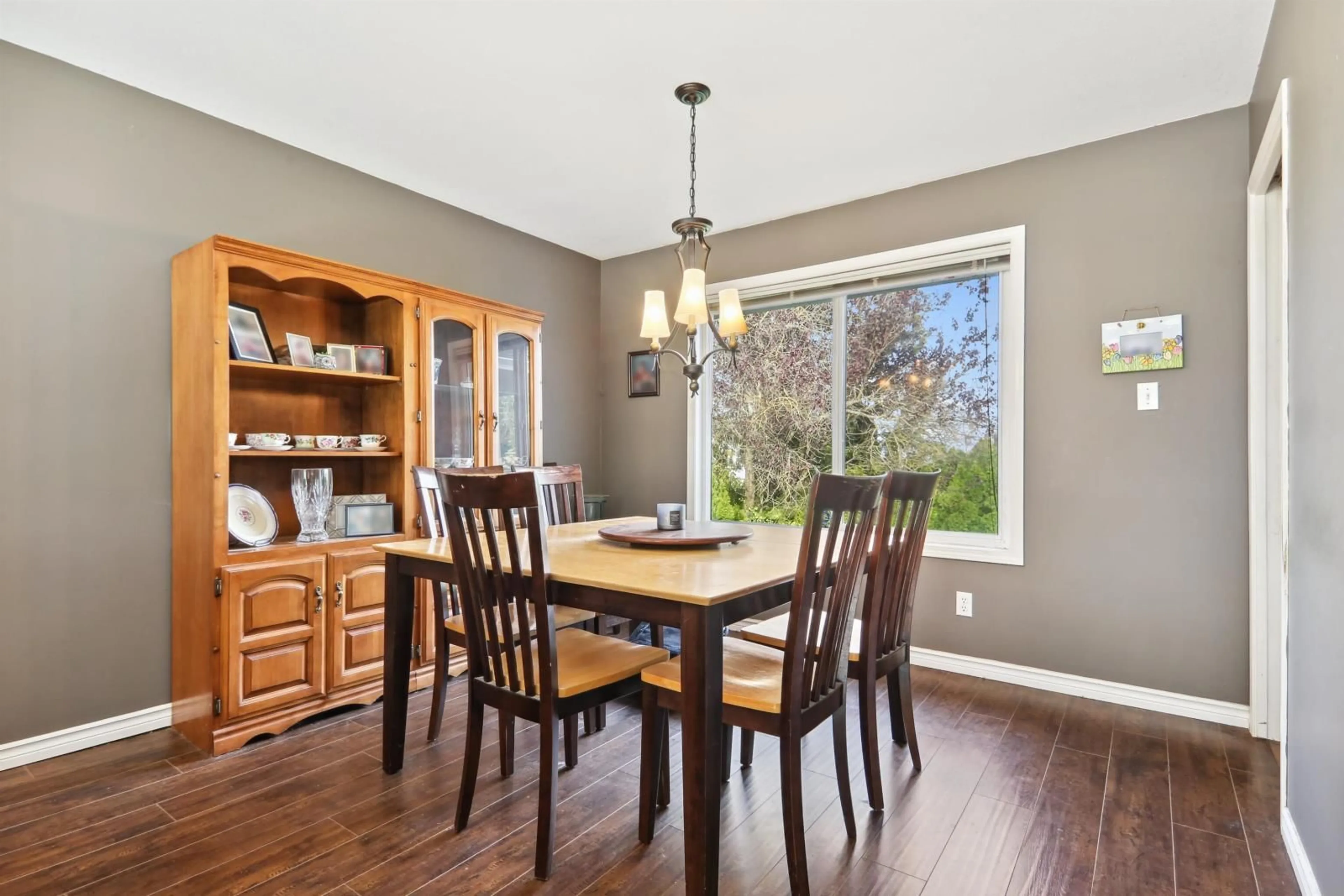 Dining room, wood floors, cottage for 46685 SYLVAN DRIVE, Chilliwack British Columbia V2R3W4