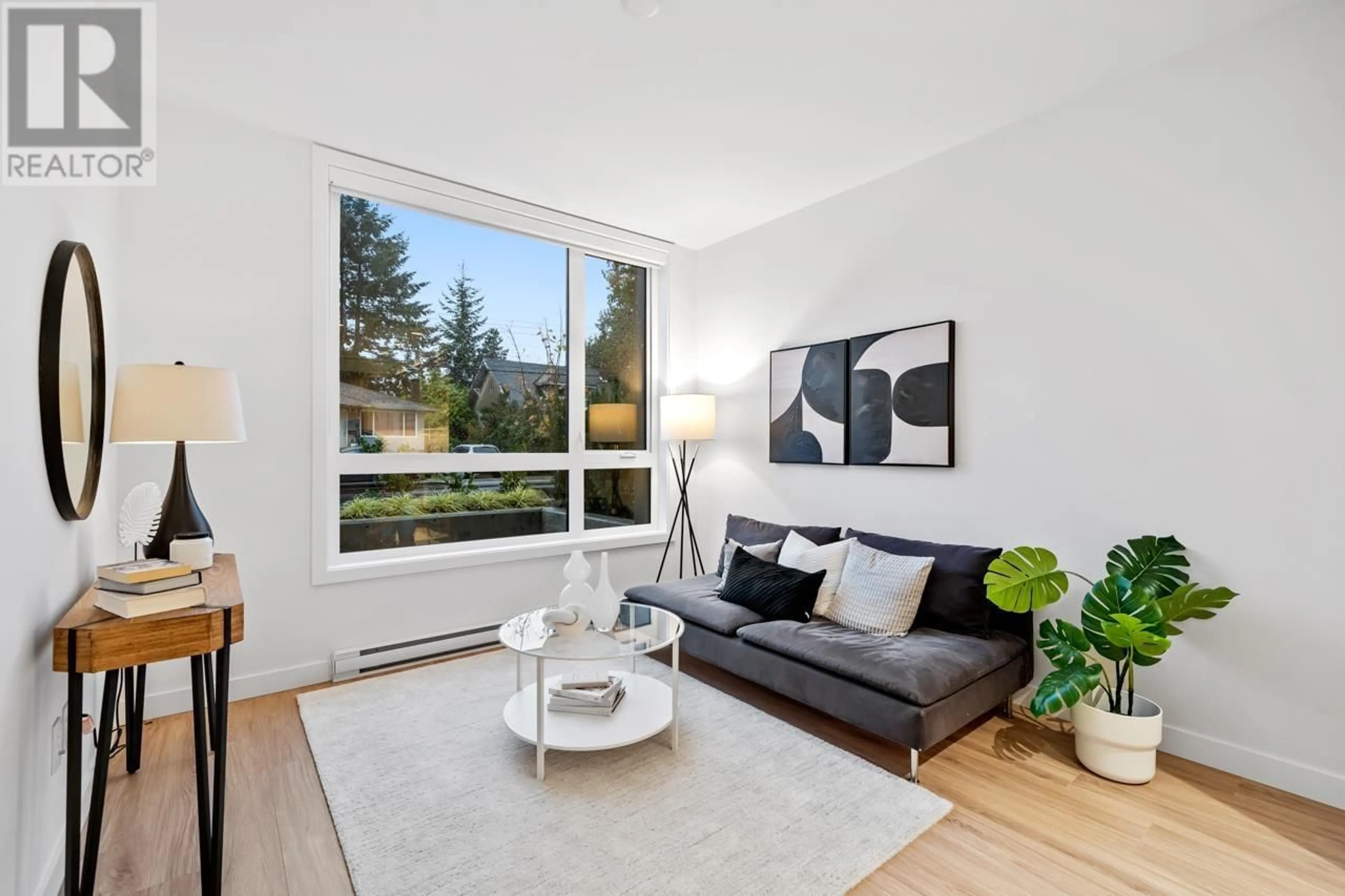 Living room, wood floors for 401 6085 IRMIN STREET, Burnaby British Columbia V5J5C5