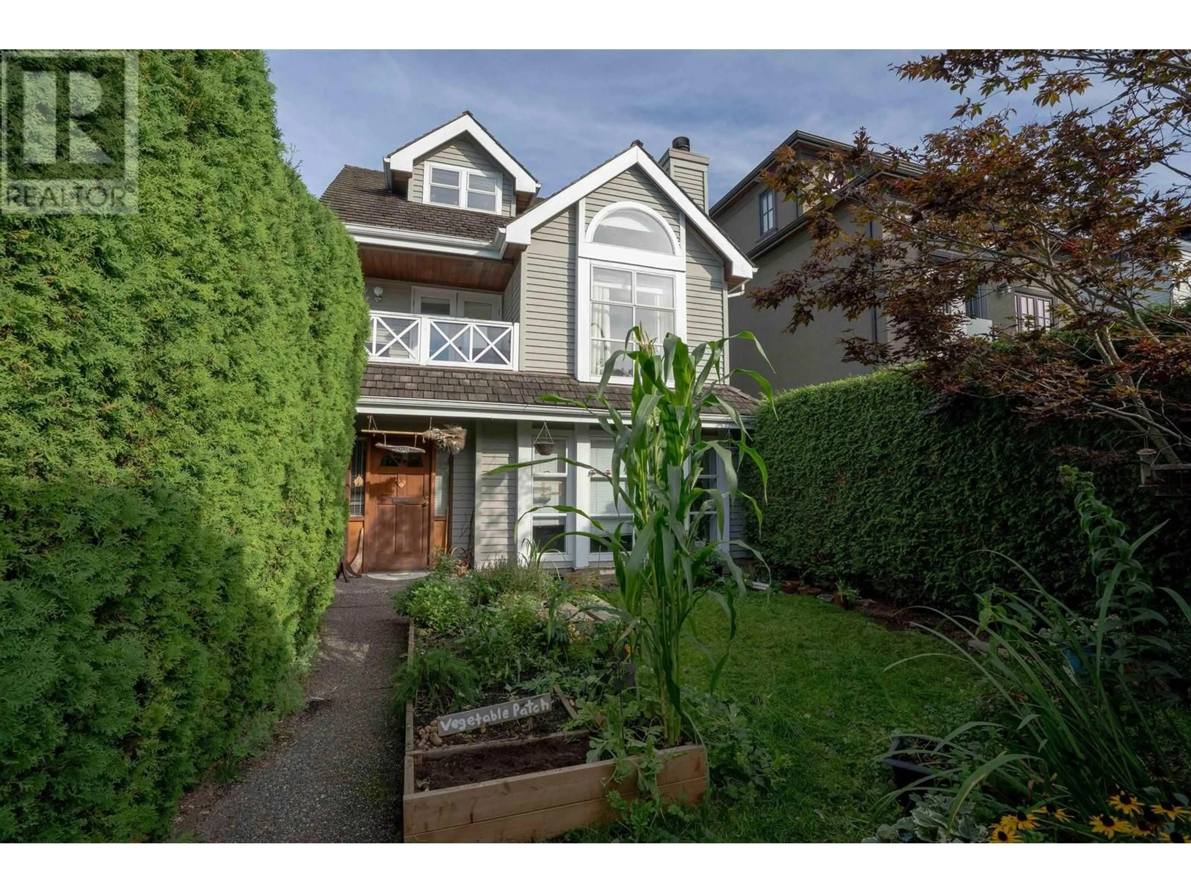 Frontside or backside of a home, cottage for 1344 LABURNUM STREET, Vancouver British Columbia V6J3W3