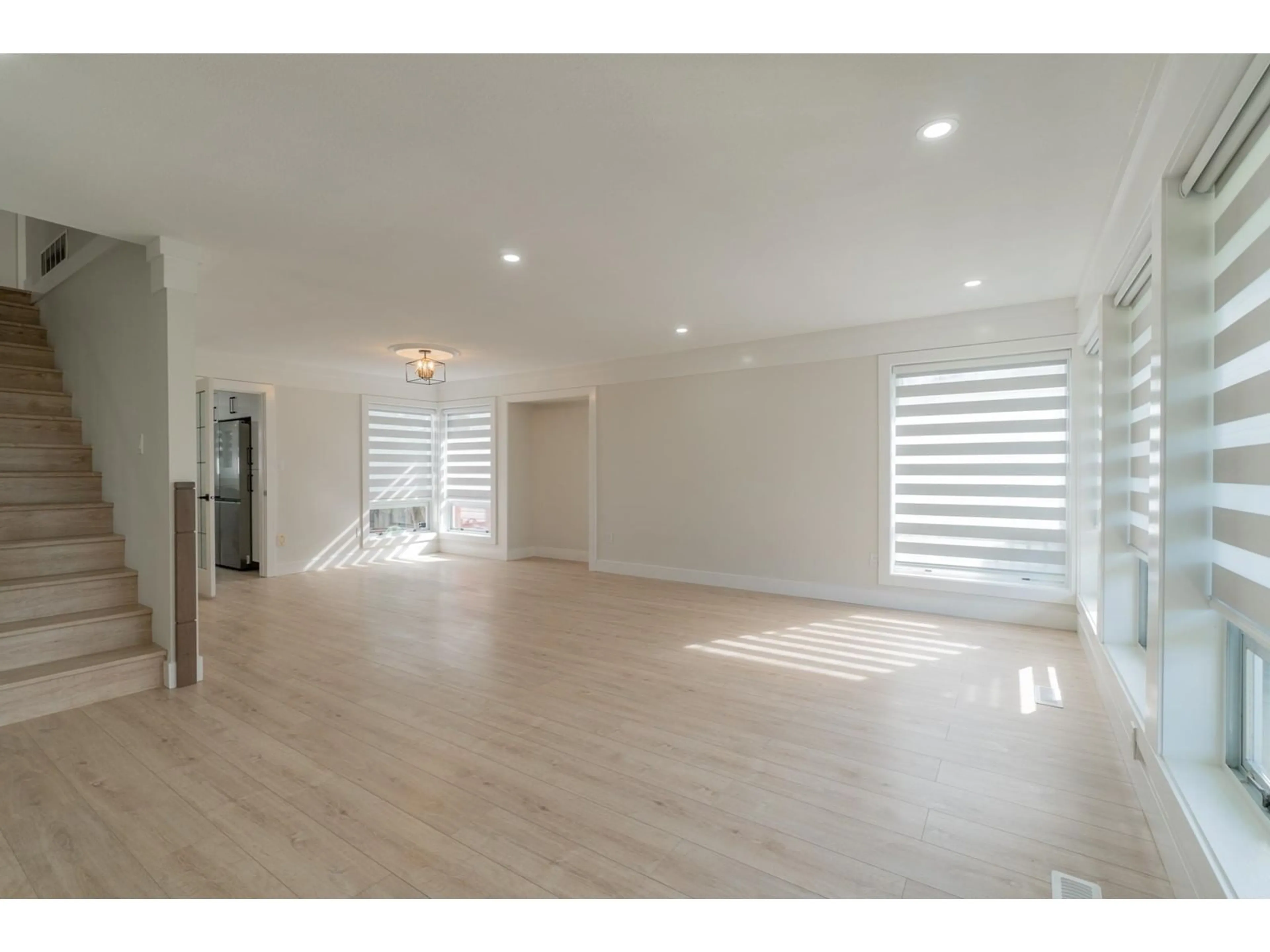 A pic of a room, wood floors for 32128 BALFOUR DRIVE, Abbotsford British Columbia V2T5C2