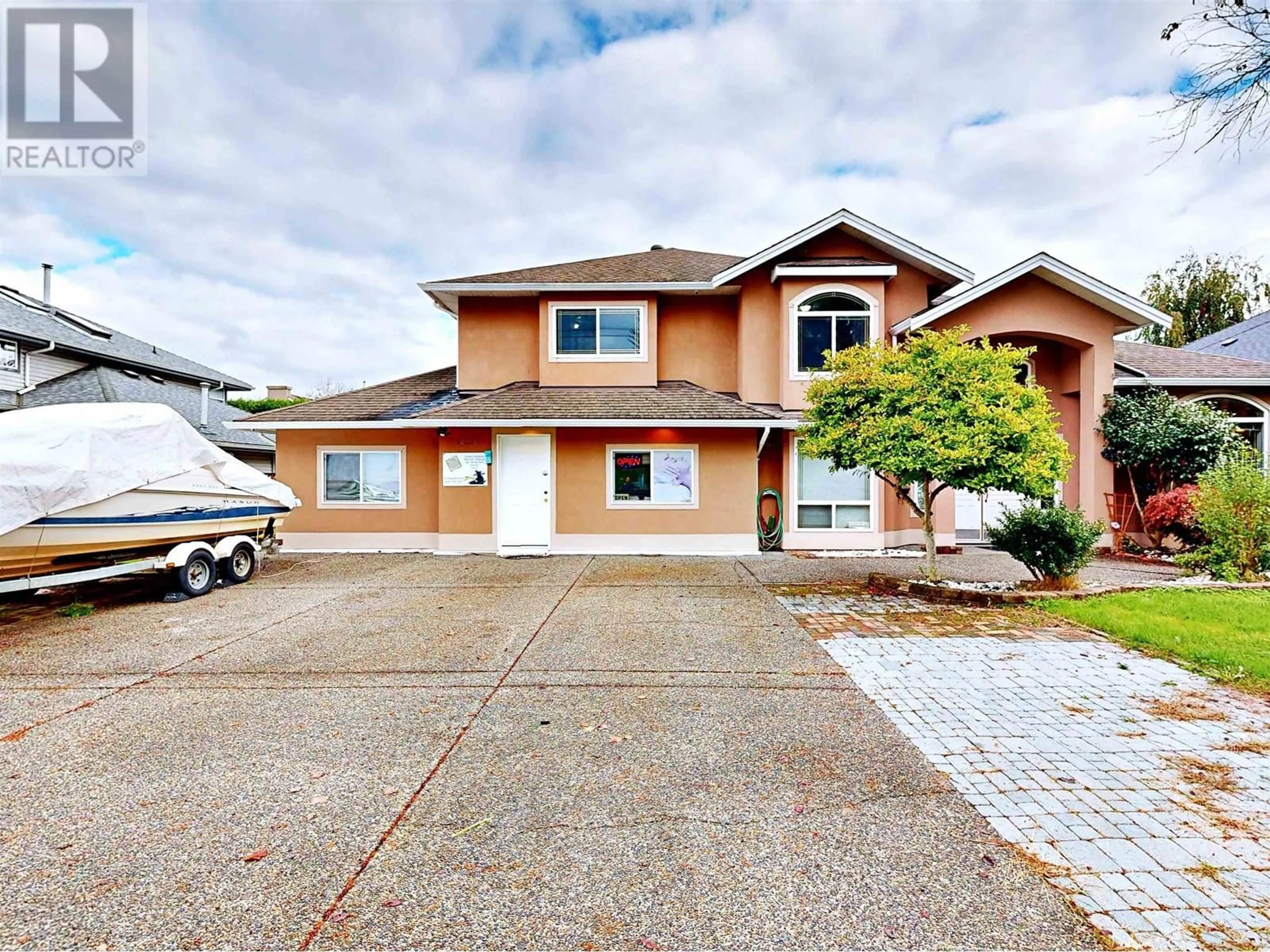 Frontside or backside of a home, the street view for 12730 227 STREET, Maple Ridge British Columbia V2X6K6