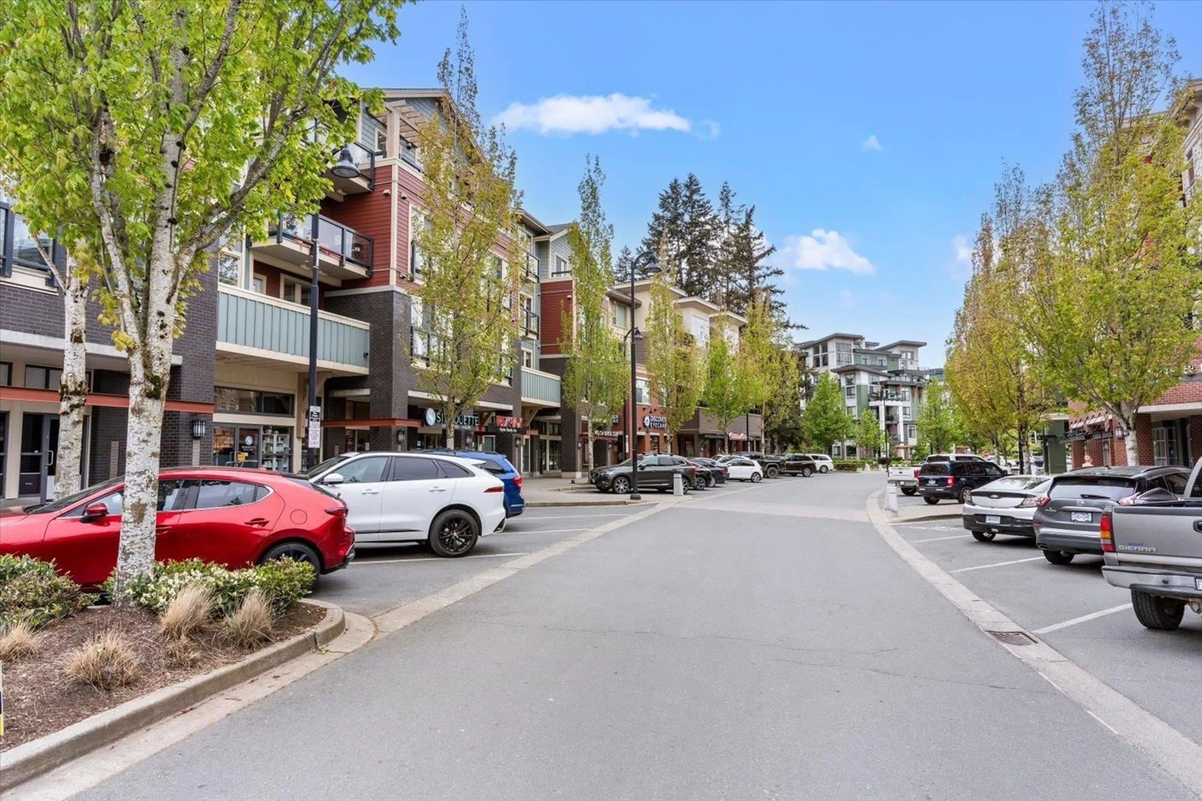 A pic from exterior of the house or condo, the street view for 206 45530 MARKET WAY|Garrison Crossing, Chilliwack British Columbia V2R0M5