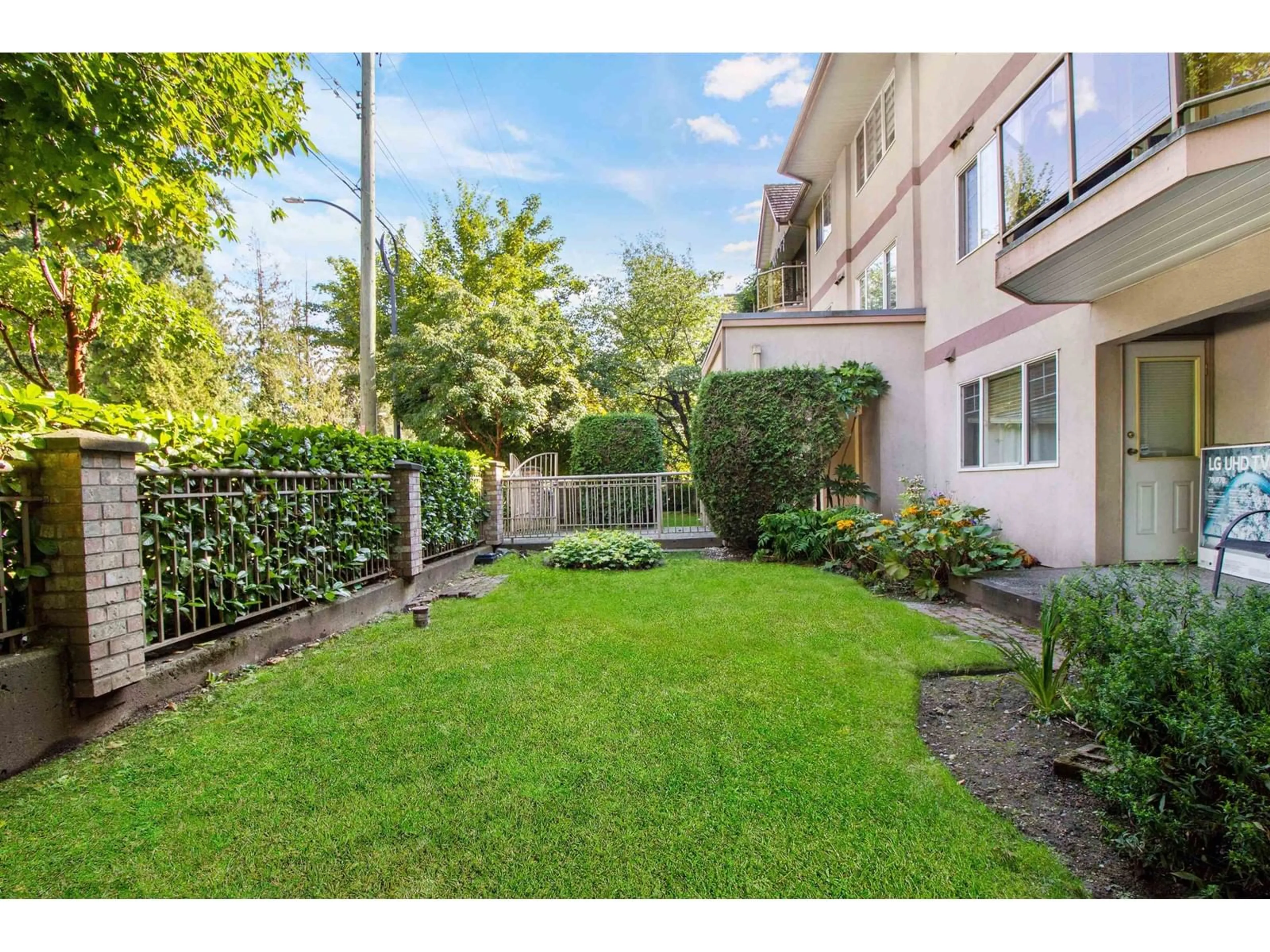 Patio, the fenced backyard for 106 9865 140 STREET, Surrey British Columbia V3T4M4