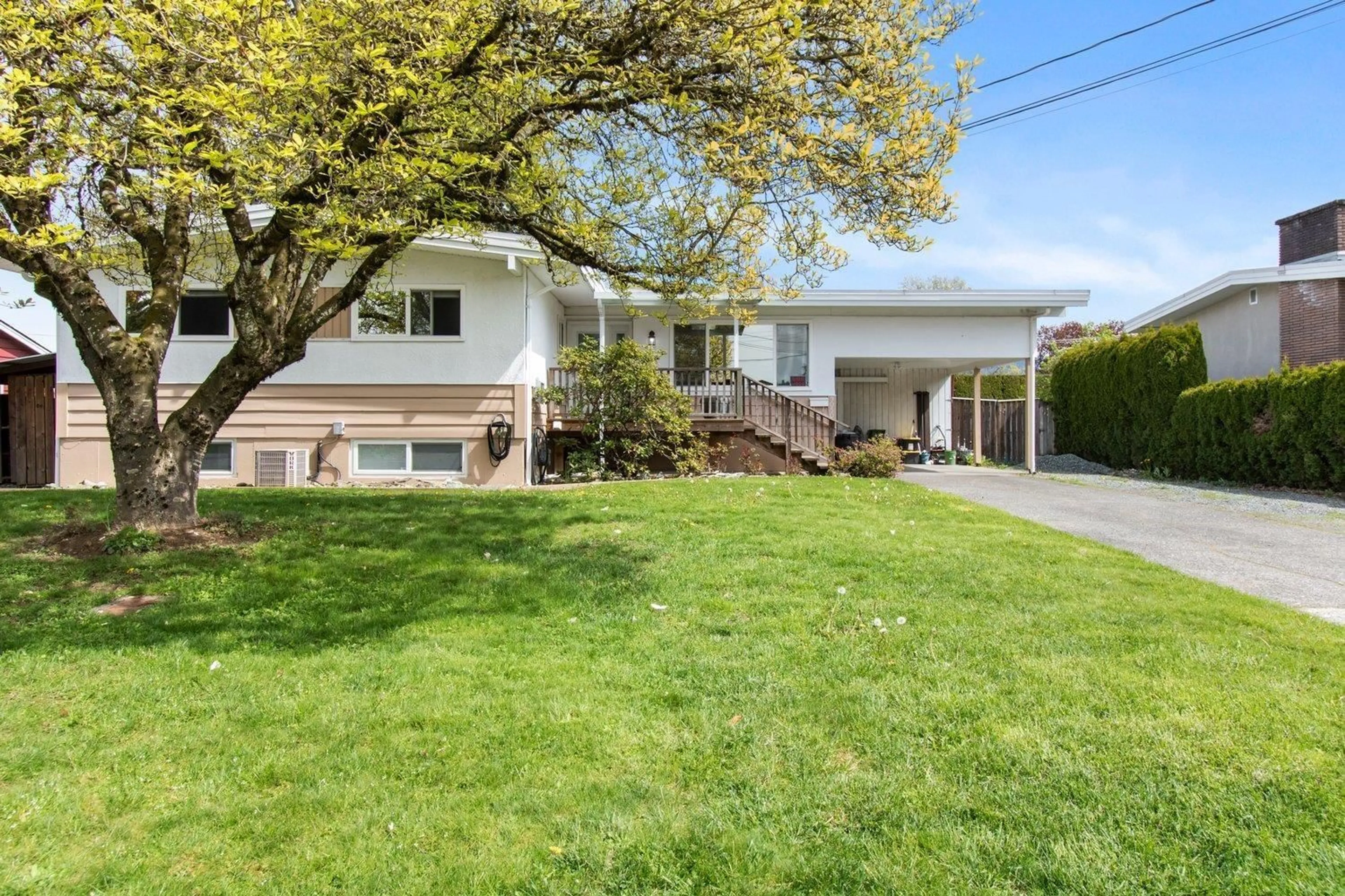 Frontside or backside of a home, the fenced backyard for 9050 SUNSET DRIVE, Chilliwack British Columbia V2P3X9