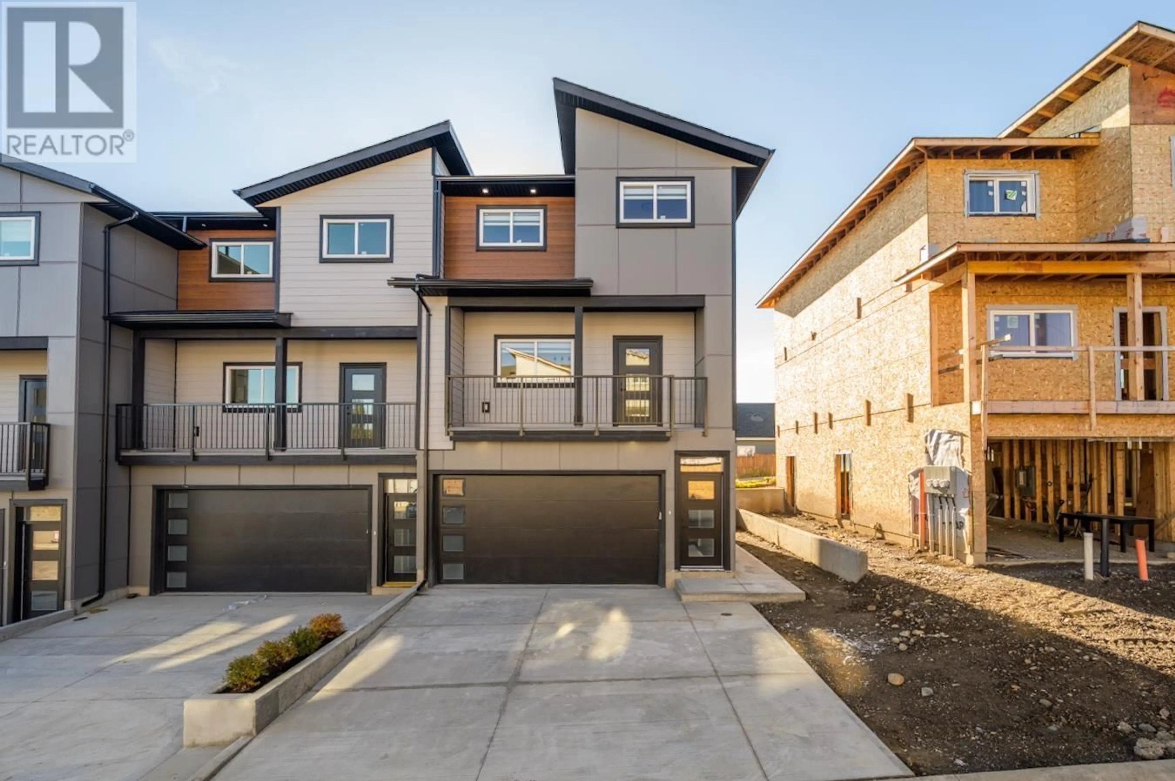 Home with brick exterior material, street for 1401 - 2395 ROWE STREET, Prince George British Columbia V2N0J3