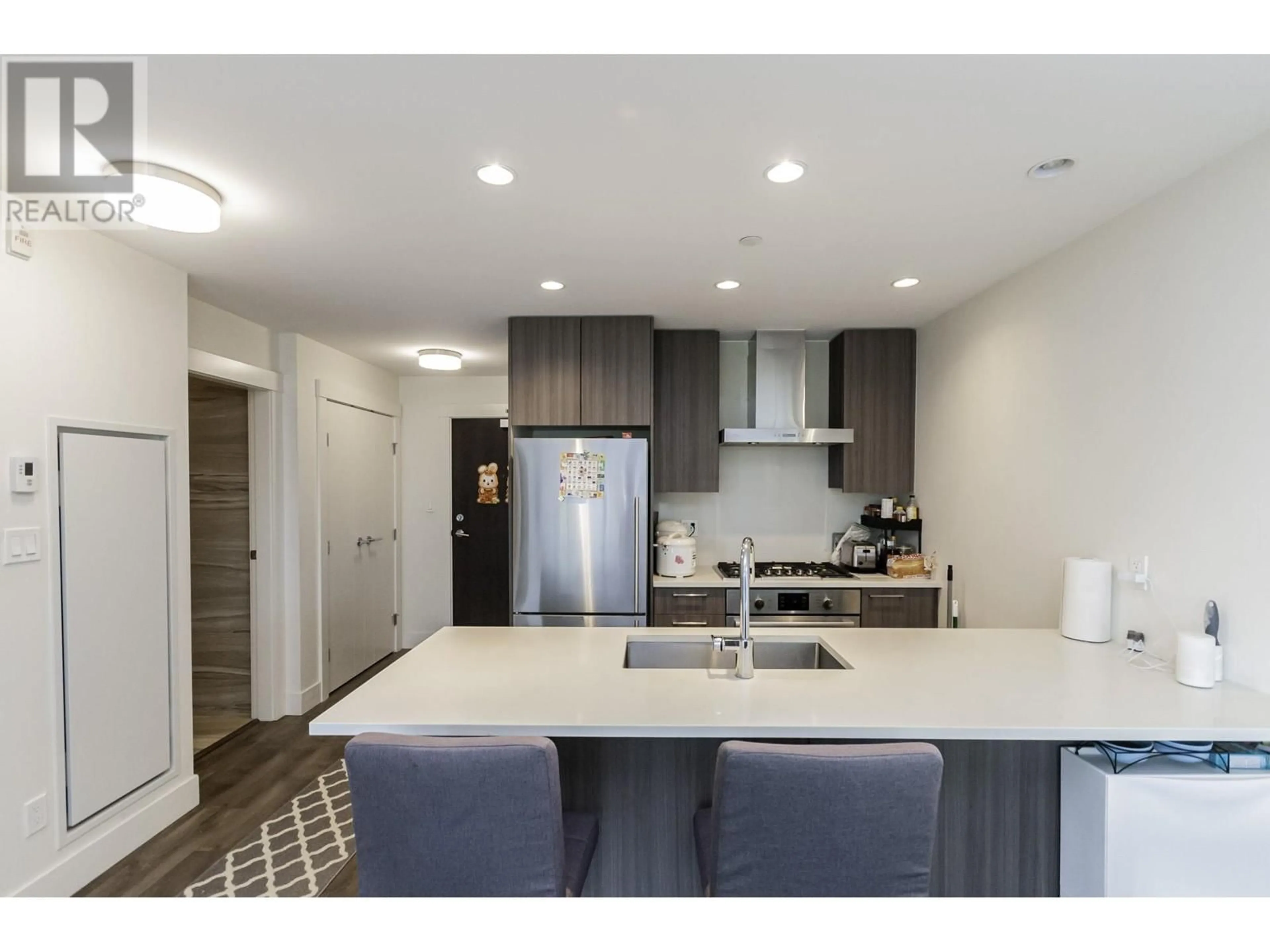 Open concept kitchen for 312 10780 NO. 5 ROAD, Richmond British Columbia V6W0B8