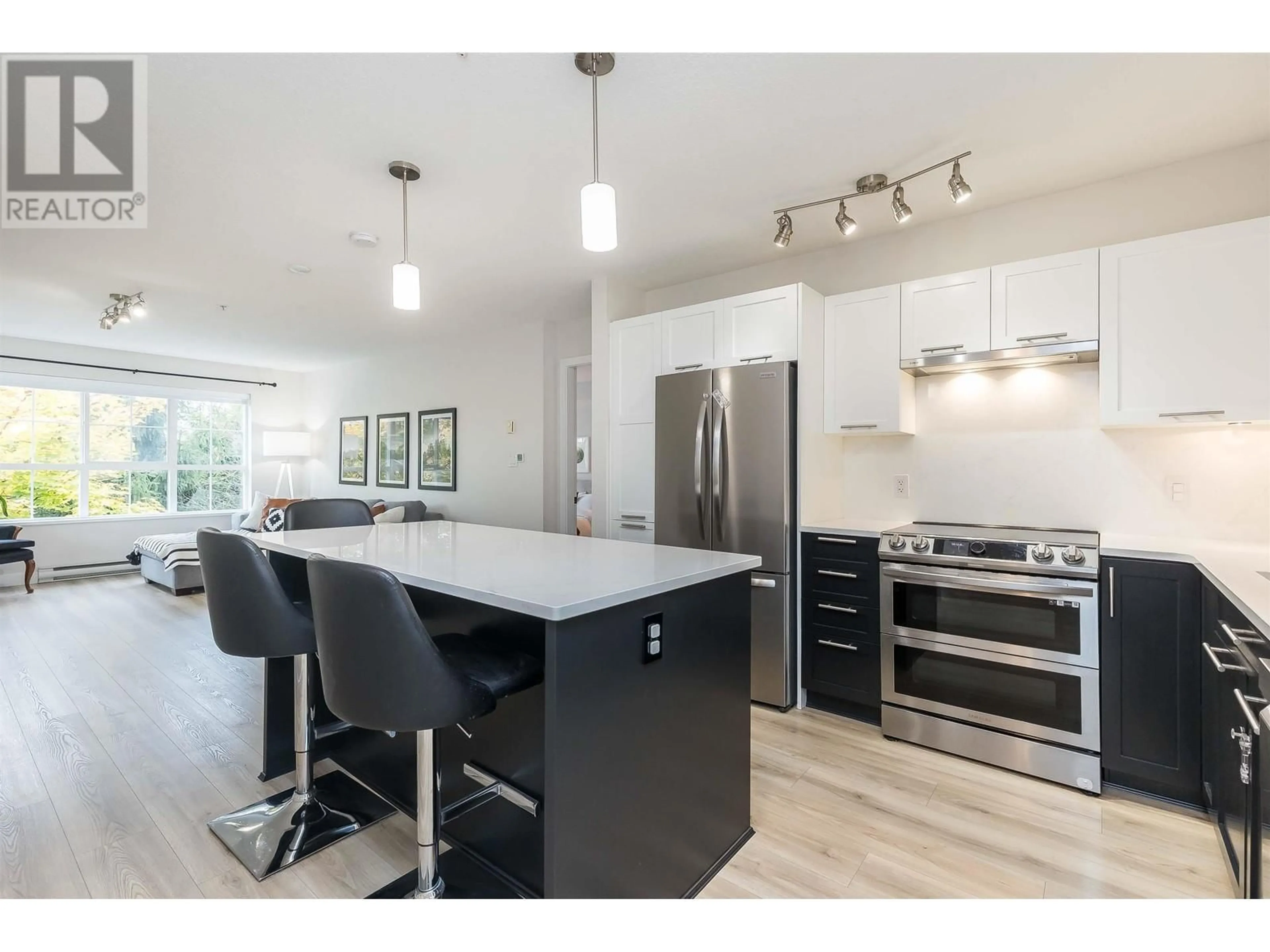 Open concept kitchen for 305 19677 MEADOW GARDENS WAY, Pitt Meadows British Columbia V3Y0A2