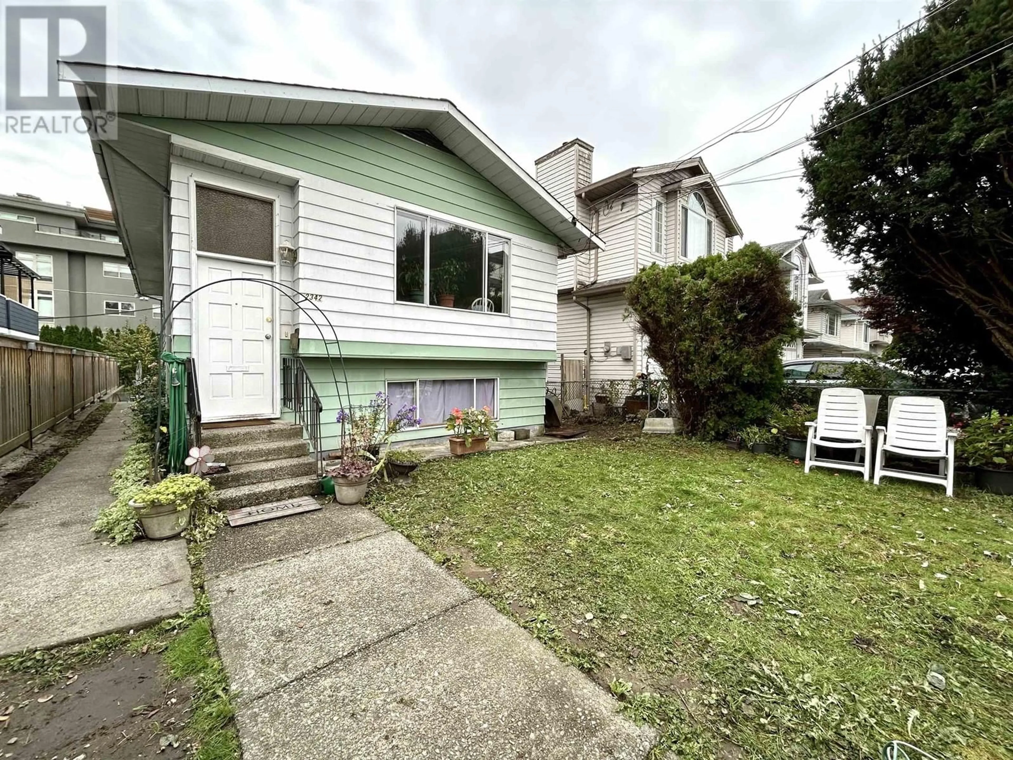 Frontside or backside of a home, the fenced backyard for 2342 KELLY AVENUE, Port Coquitlam British Columbia V3C1Y2