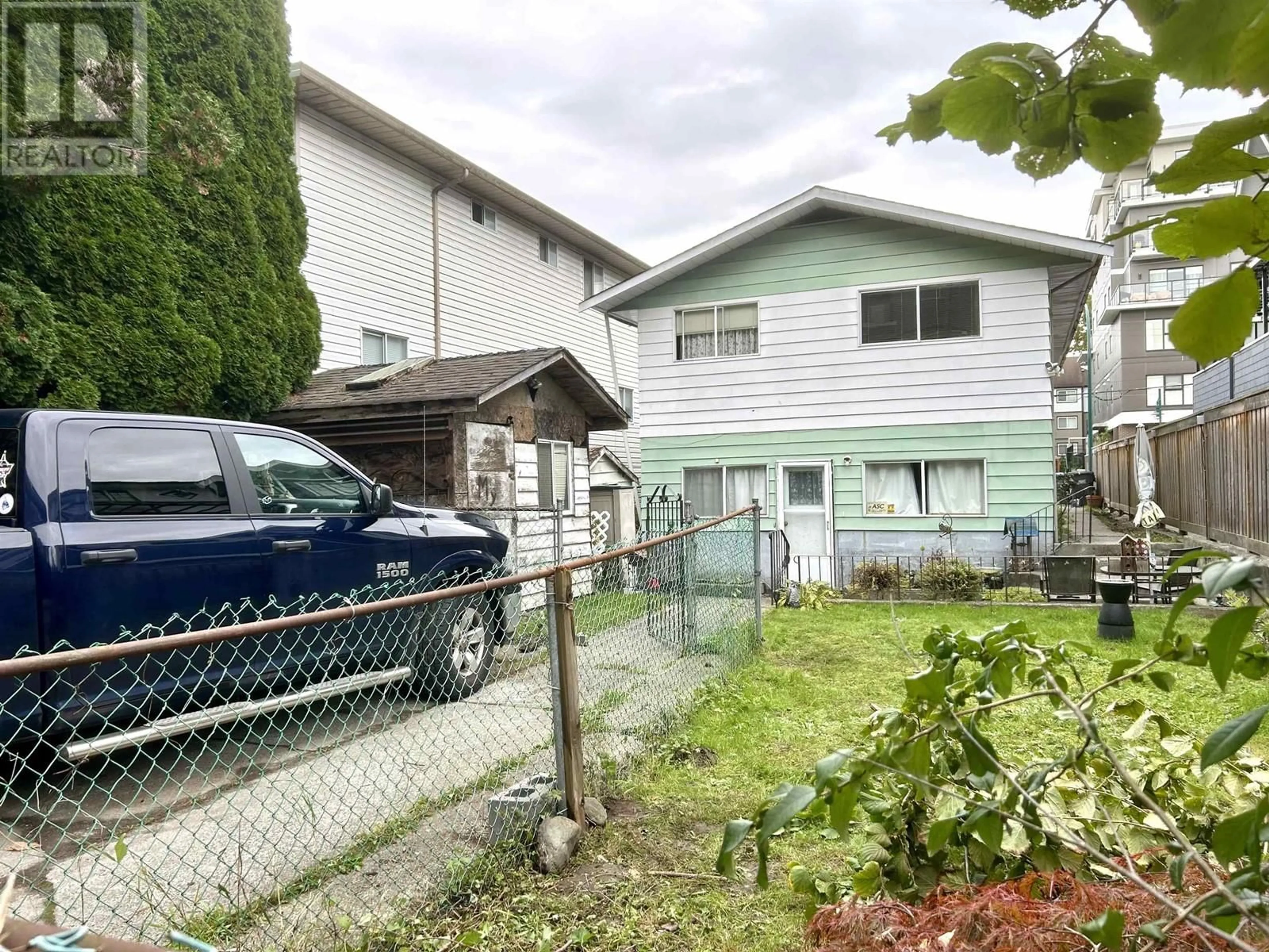 Frontside or backside of a home, the fenced backyard for 2342 KELLY AVENUE, Port Coquitlam British Columbia V3C1Y2