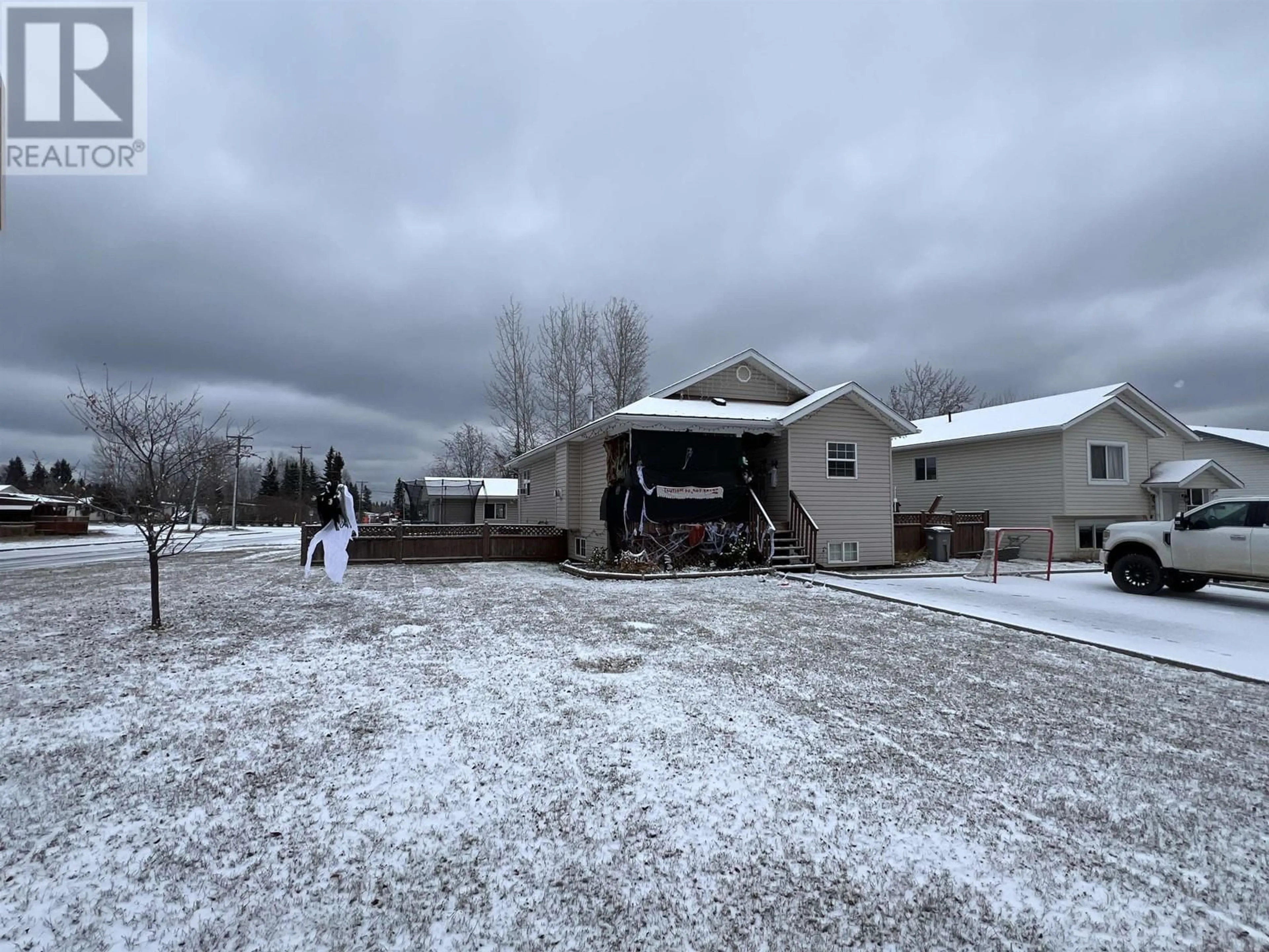 Frontside or backside of a home, the street view for 4403 HERITAGE CRESCENT, Fort Nelson British Columbia V0C1R0