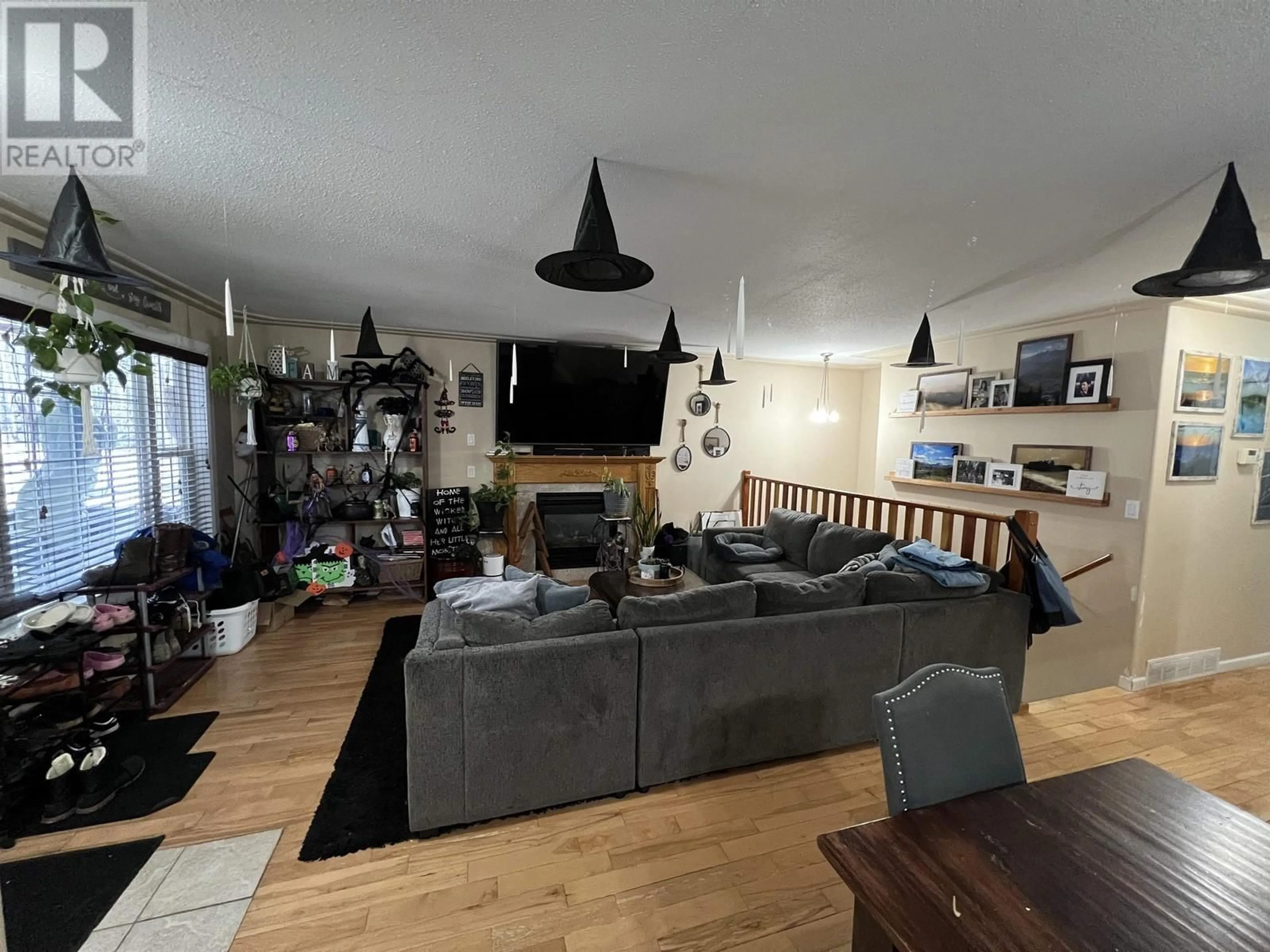 Living room, wood floors for 4403 HERITAGE CRESCENT, Fort Nelson British Columbia V0C1R0