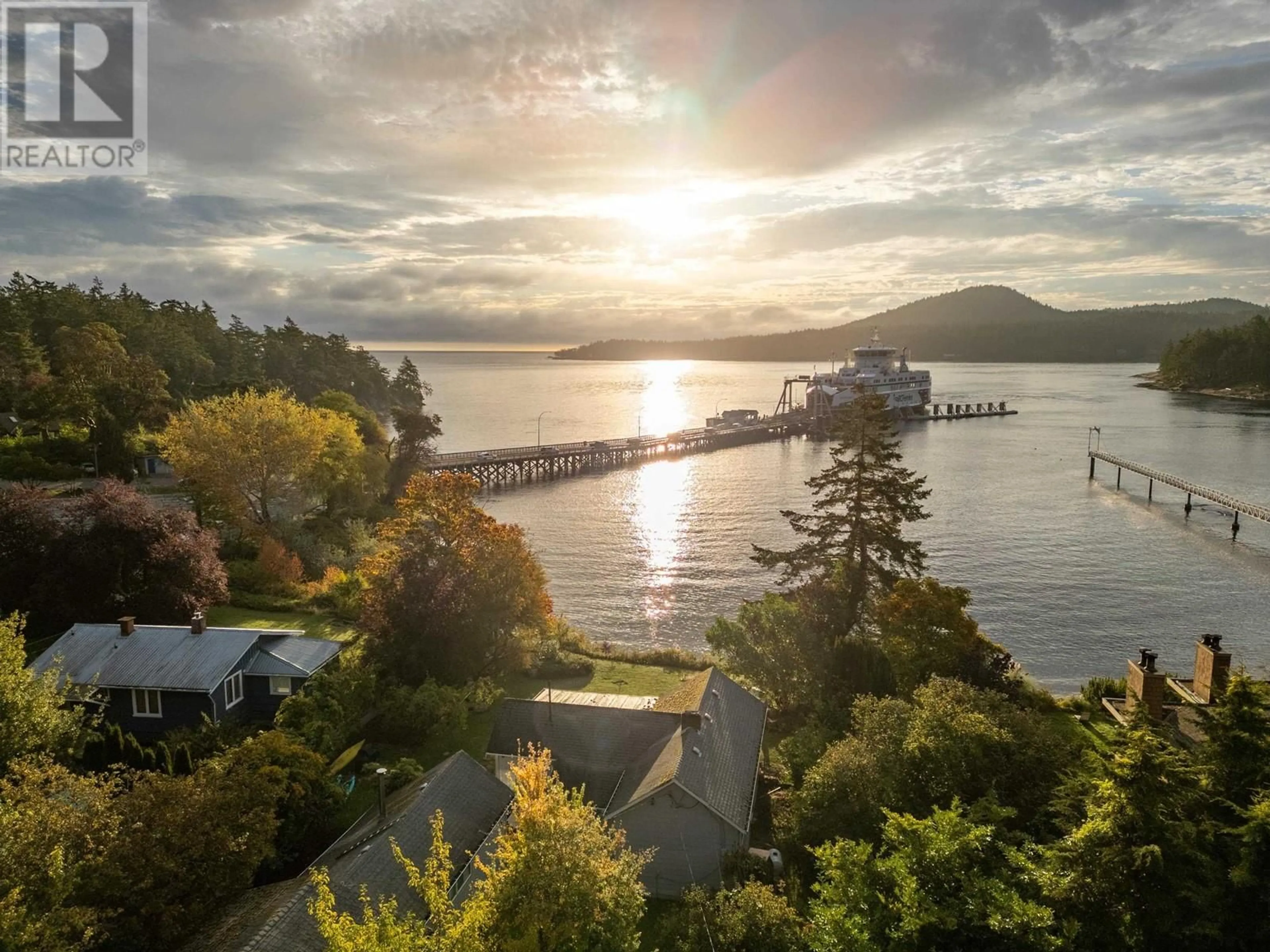 A pic from outside/outdoor area/front of a property/back of a property/a pic from drone, water/lake/river/ocean view for 105 MADRONA ROAD, Galiano Island British Columbia V0N1P0