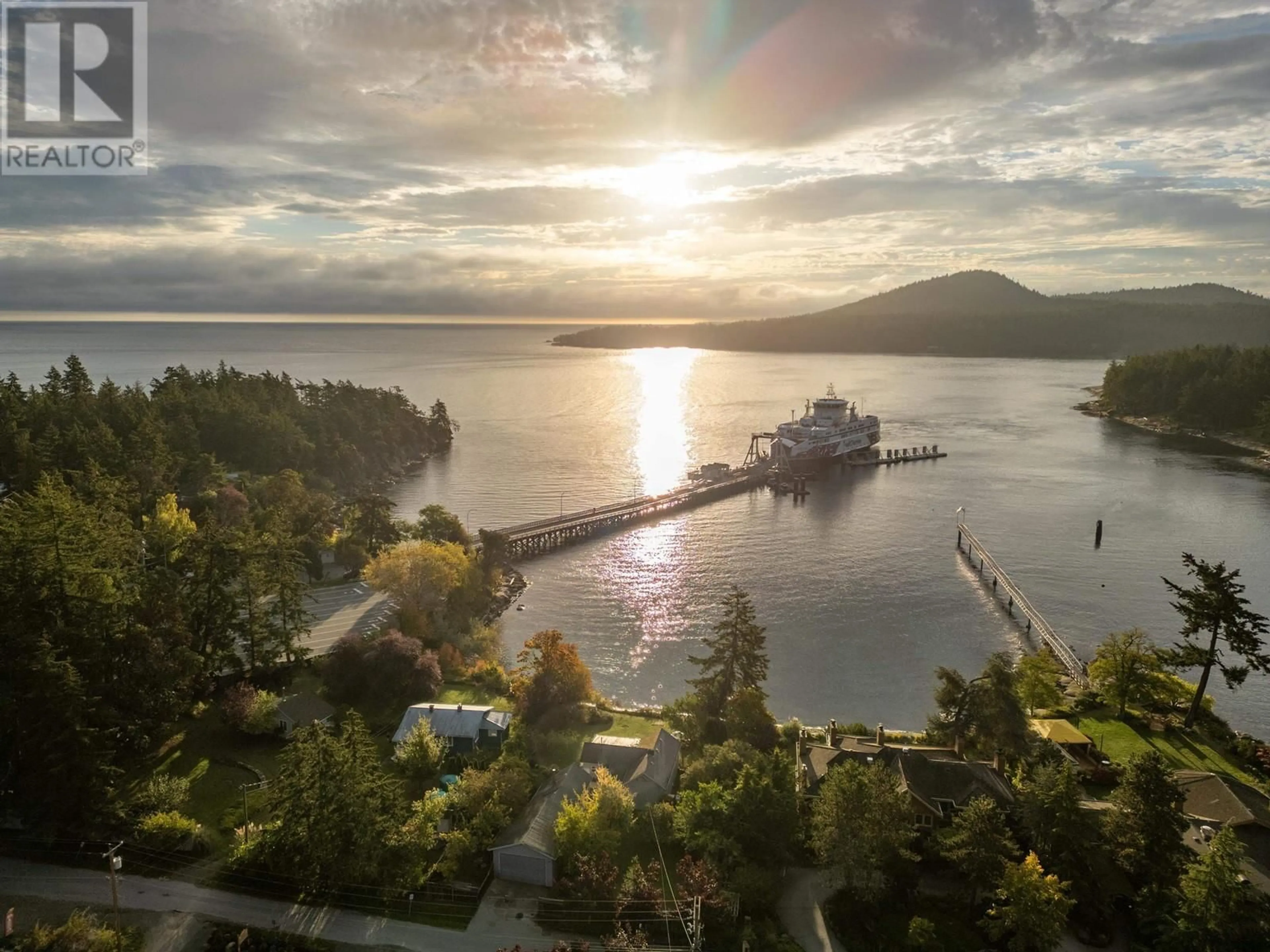 A pic from outside/outdoor area/front of a property/back of a property/a pic from drone, water/lake/river/ocean view for 105 MADRONA ROAD, Galiano Island British Columbia V0N1P0