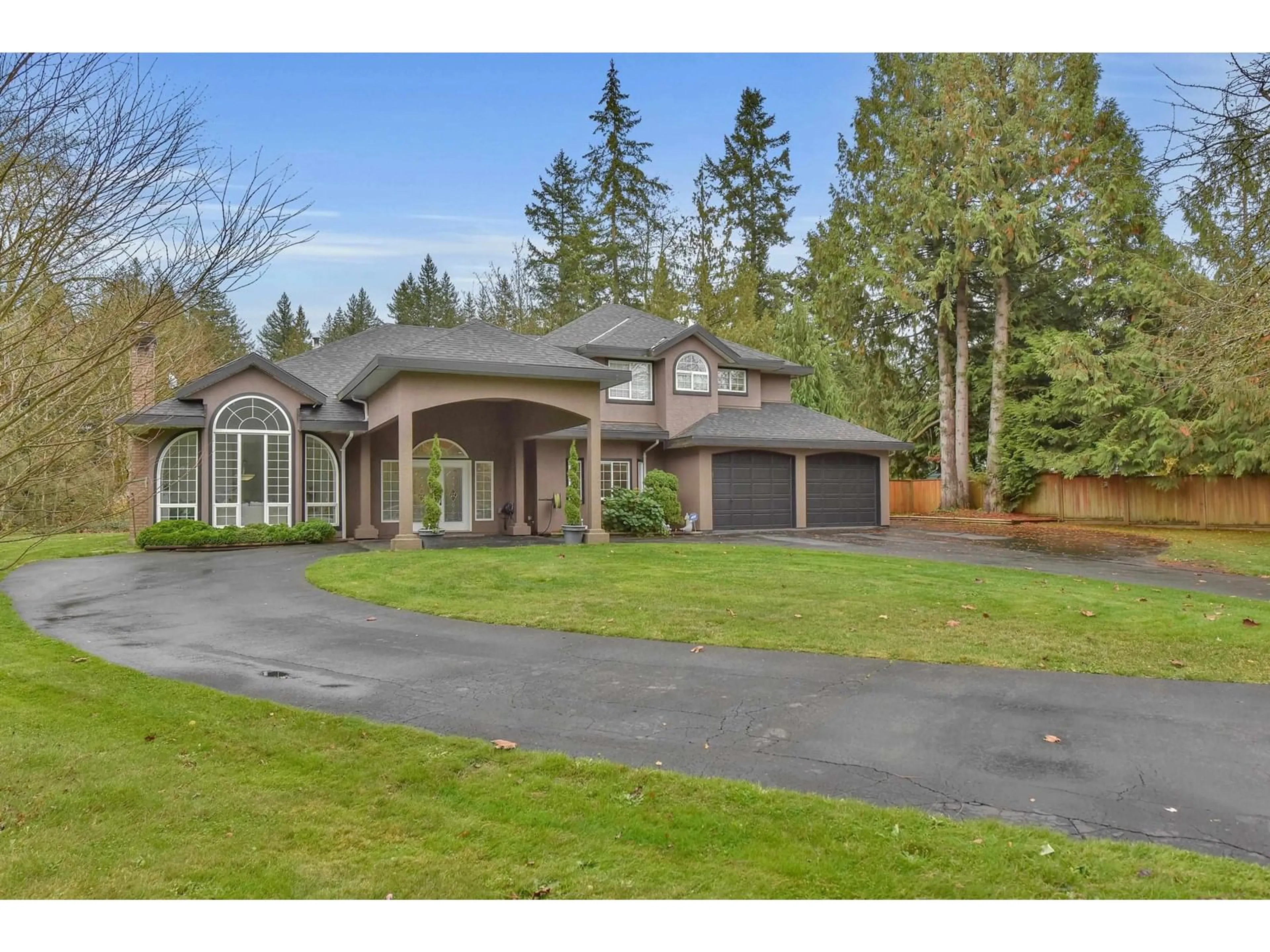 Frontside or backside of a home, cottage for 20054 FERNRIDGE CRESCENT, Langley British Columbia V3A4P4